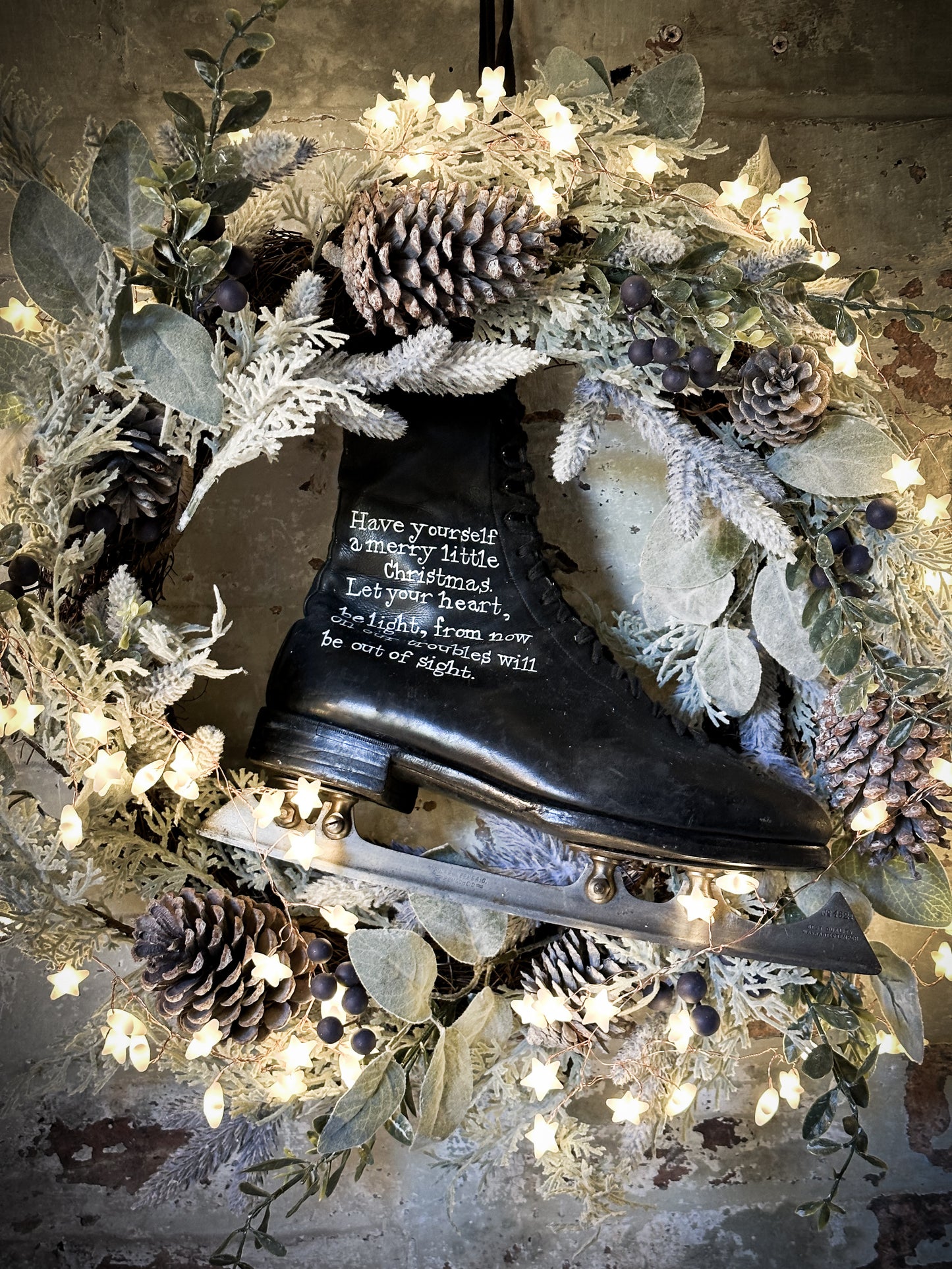 A beautiful vintage Christmas ice skate hand painted using traditional sign writer’s techniques and materials