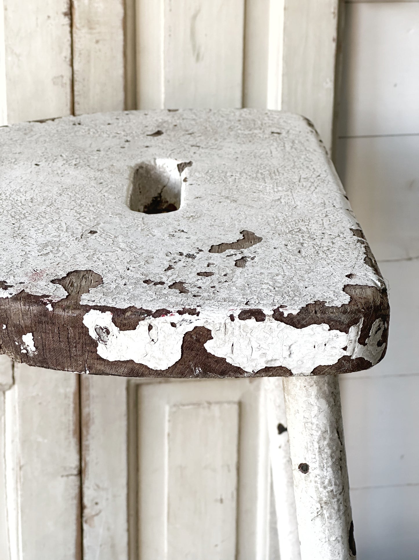 A chippy white French engineer’s stool 1930’s