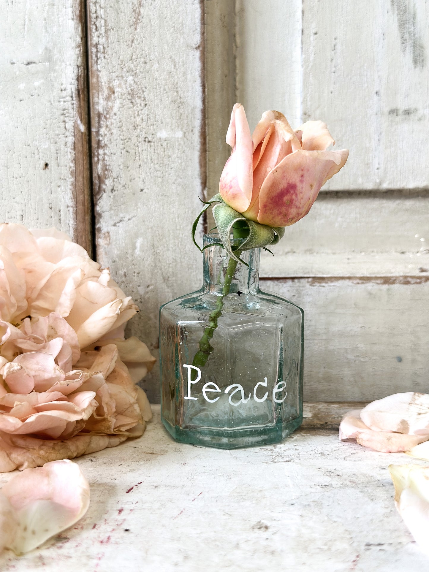 A beautiful Victorian bottle with a hand painted quote