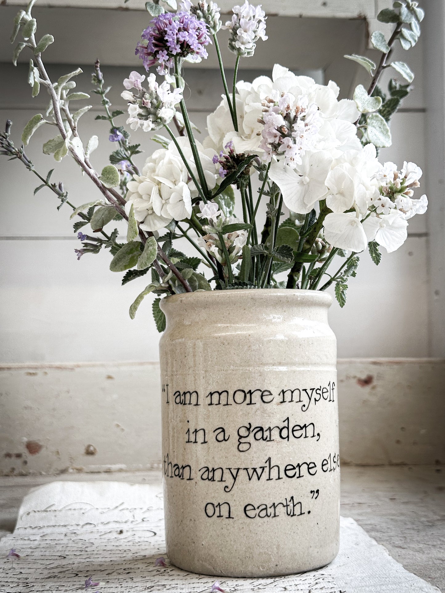 A Victorian unearthed short stoneware pottery jar with a hand painted quote