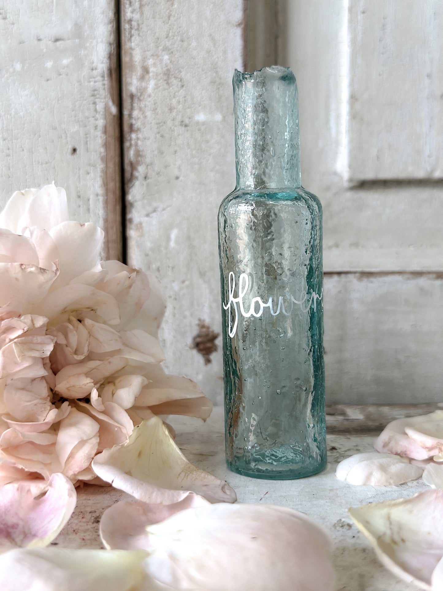 A beautiful Victorian bottle with a hand painted quote