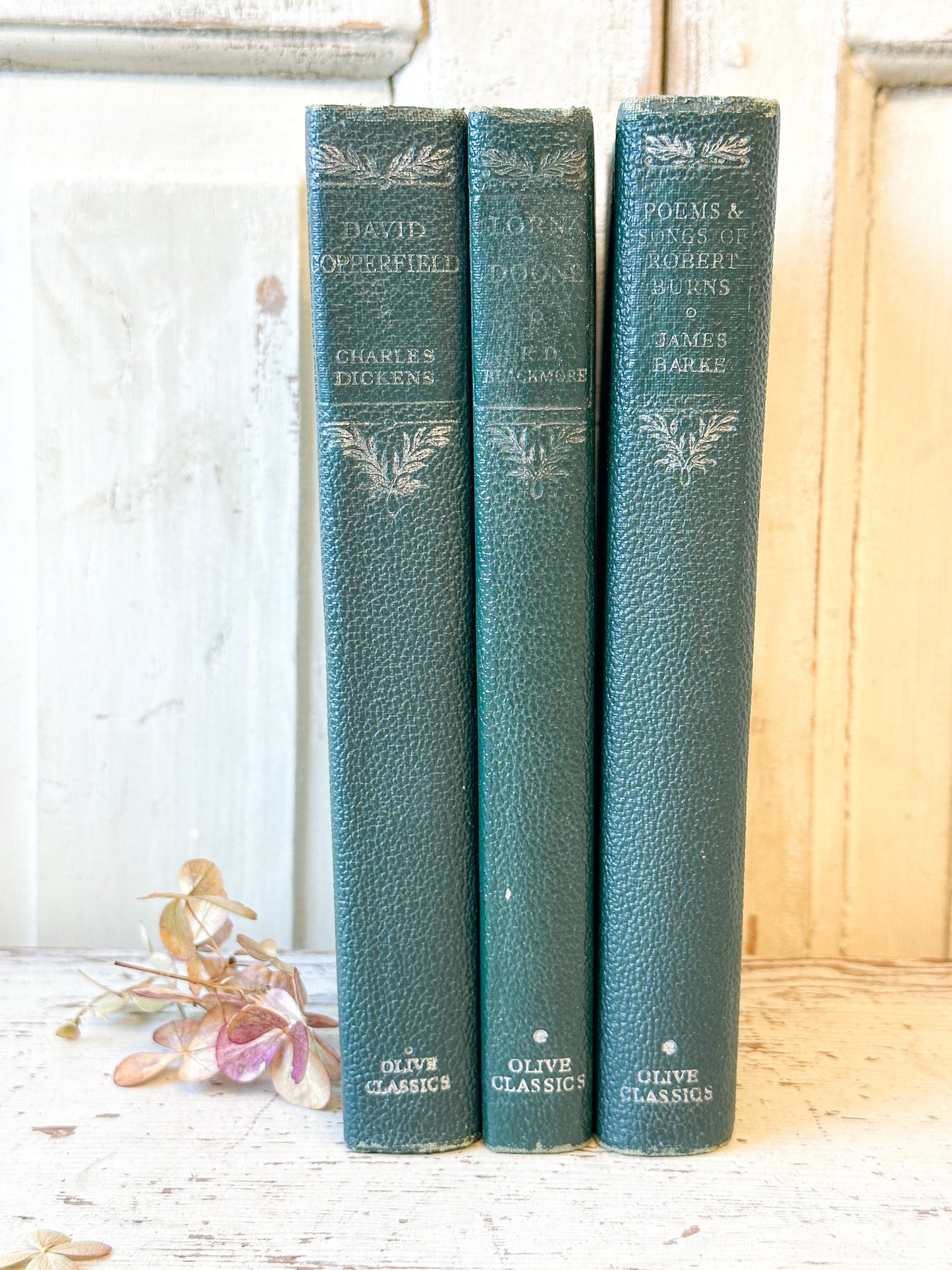 Three Olive Classics books “Lorna Doone” by R.D. Blackmore, “Robert Burnes poems”, “David Copperfield” by Charles Dickens