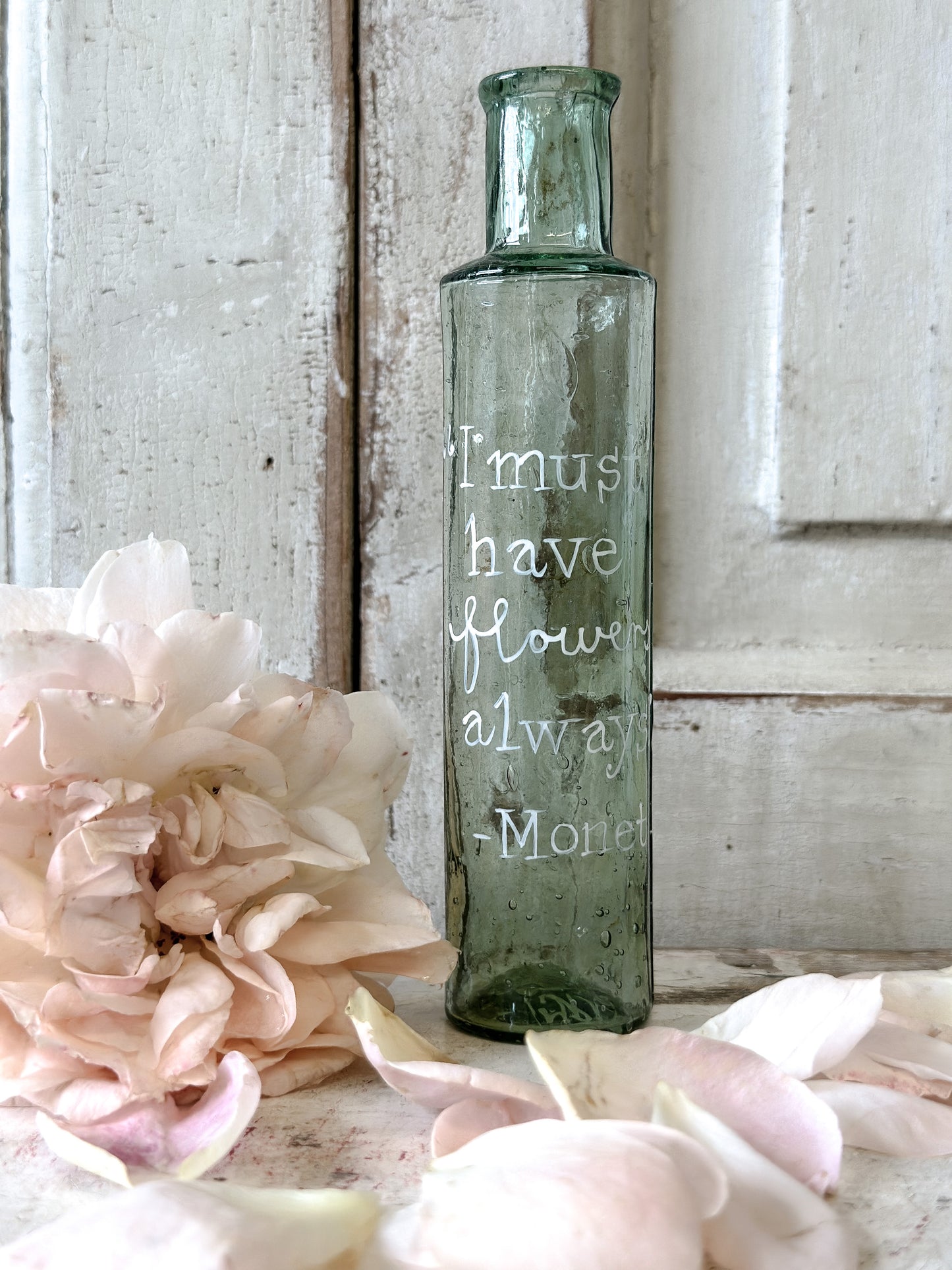 A beautiful Victorian bottle with a hand painted quote