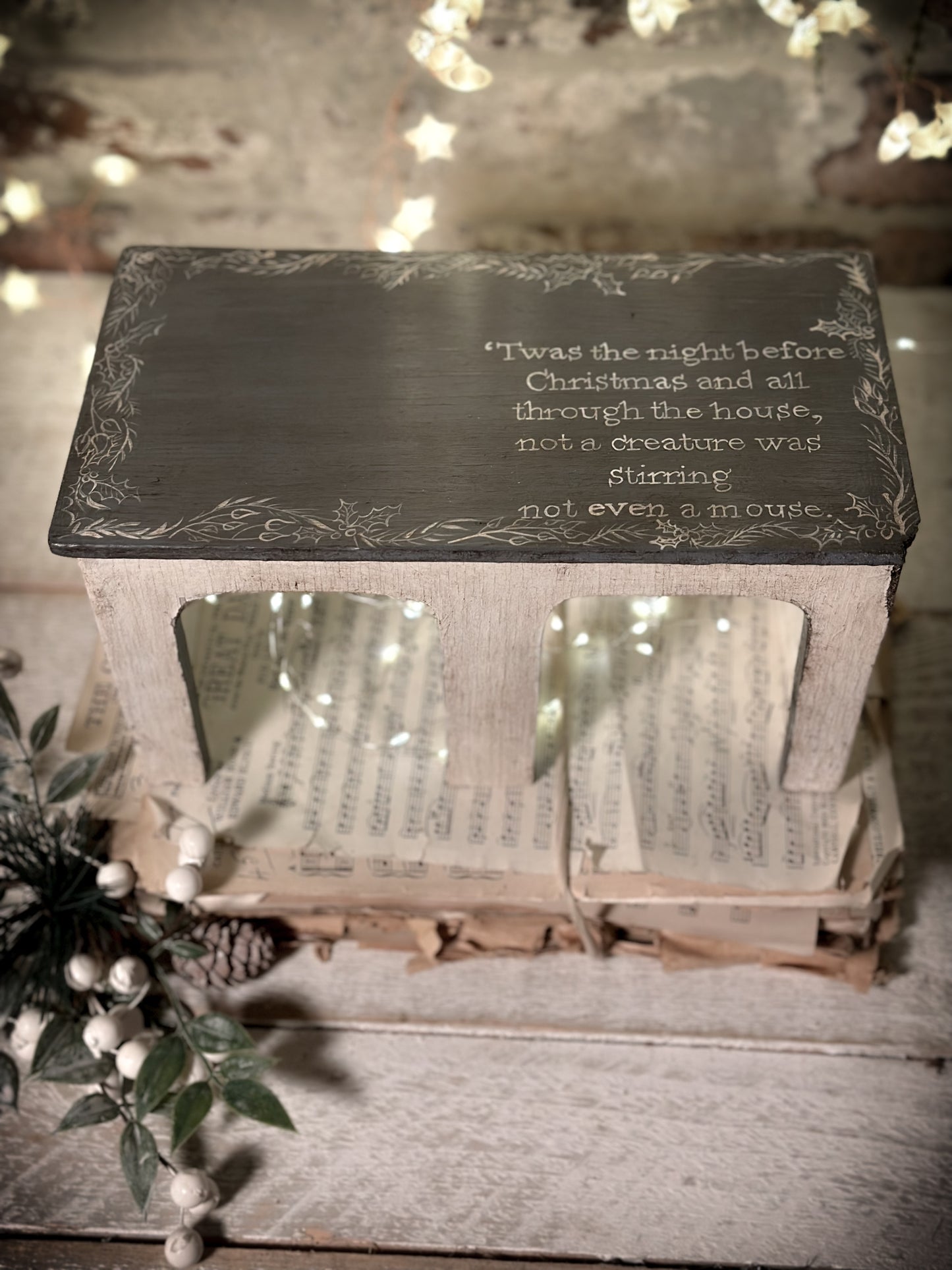 A hand painted quote on a vintage scratch built folk art model farm barn