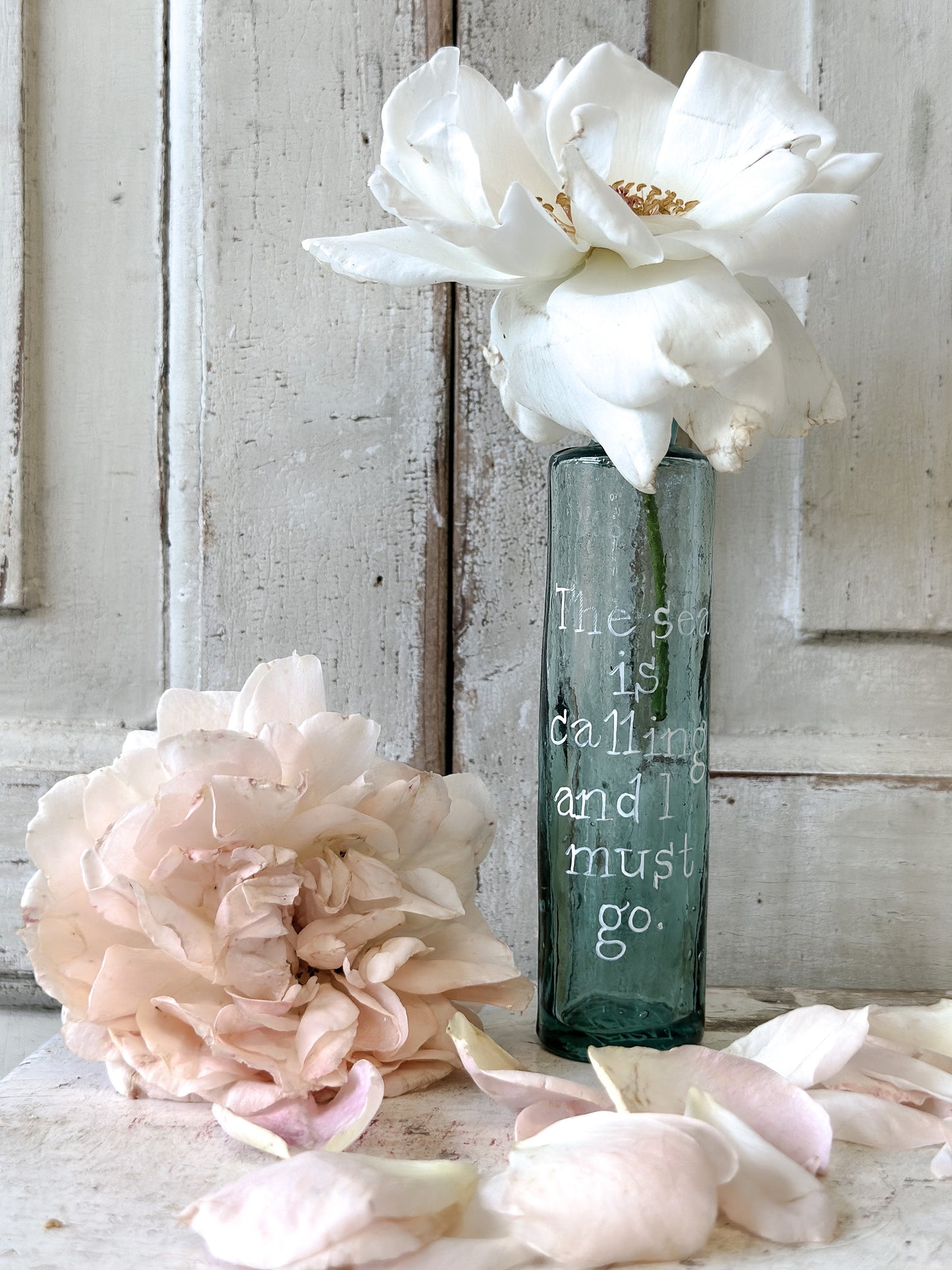 A beautiful Victorian bottle with a hand painted quote