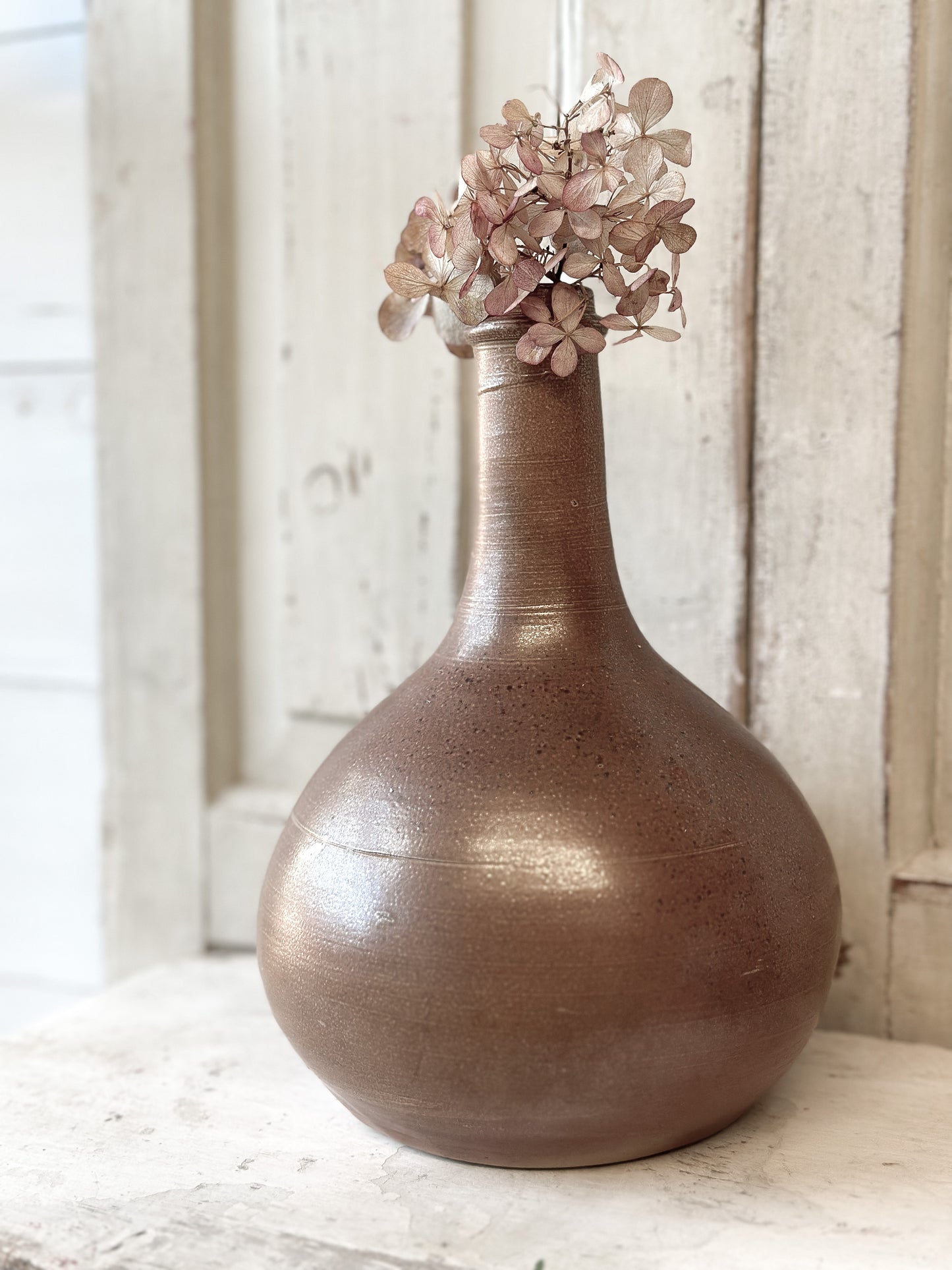A wonderful antique French glazed wine bottle