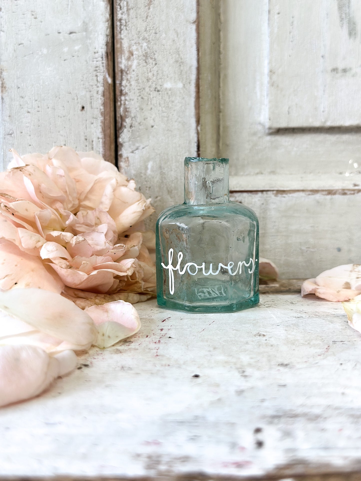 A beautiful Victorian bottle with a hand painted quote