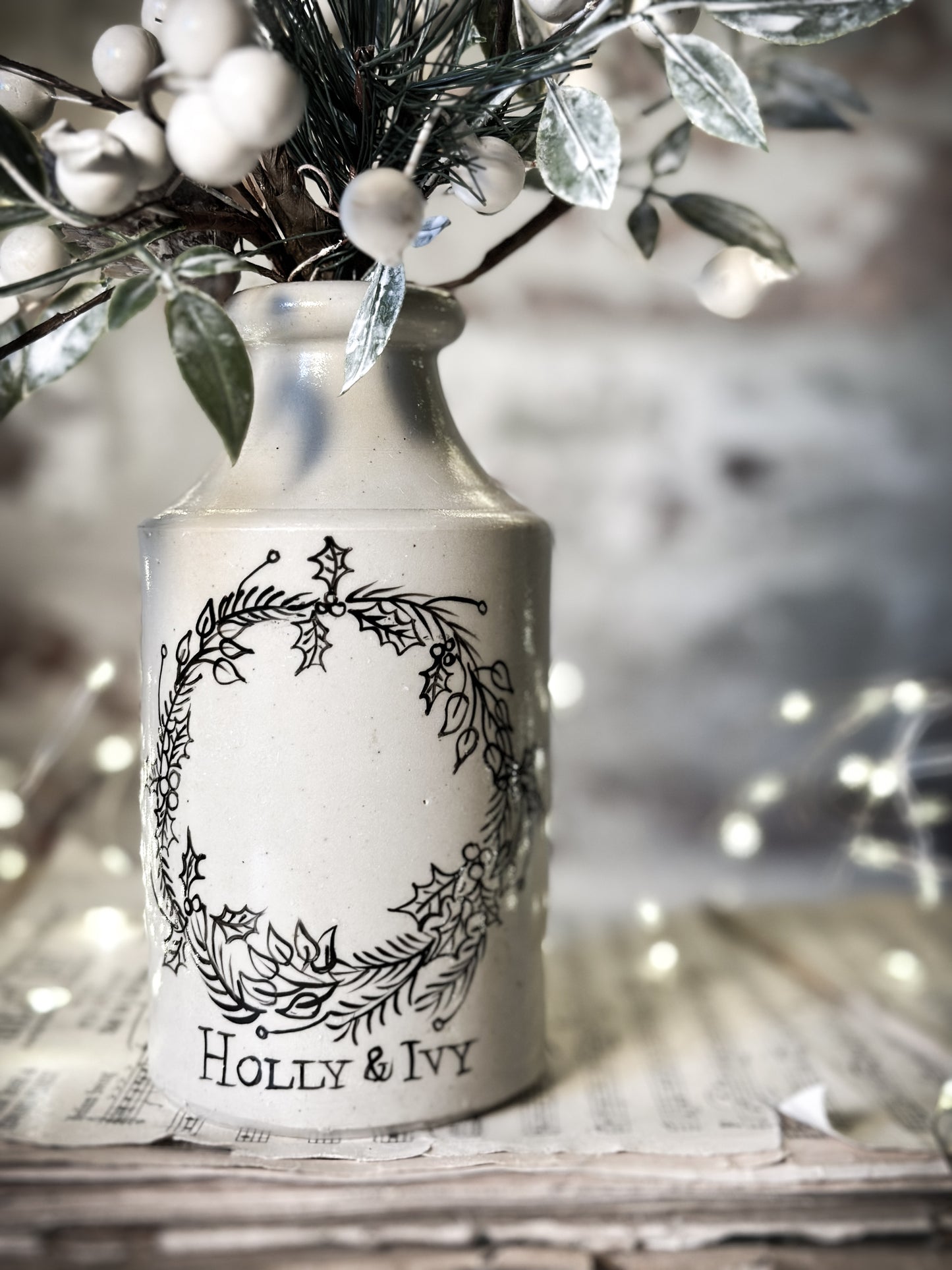 A hand painted and illustrated vintage Victorian bottle