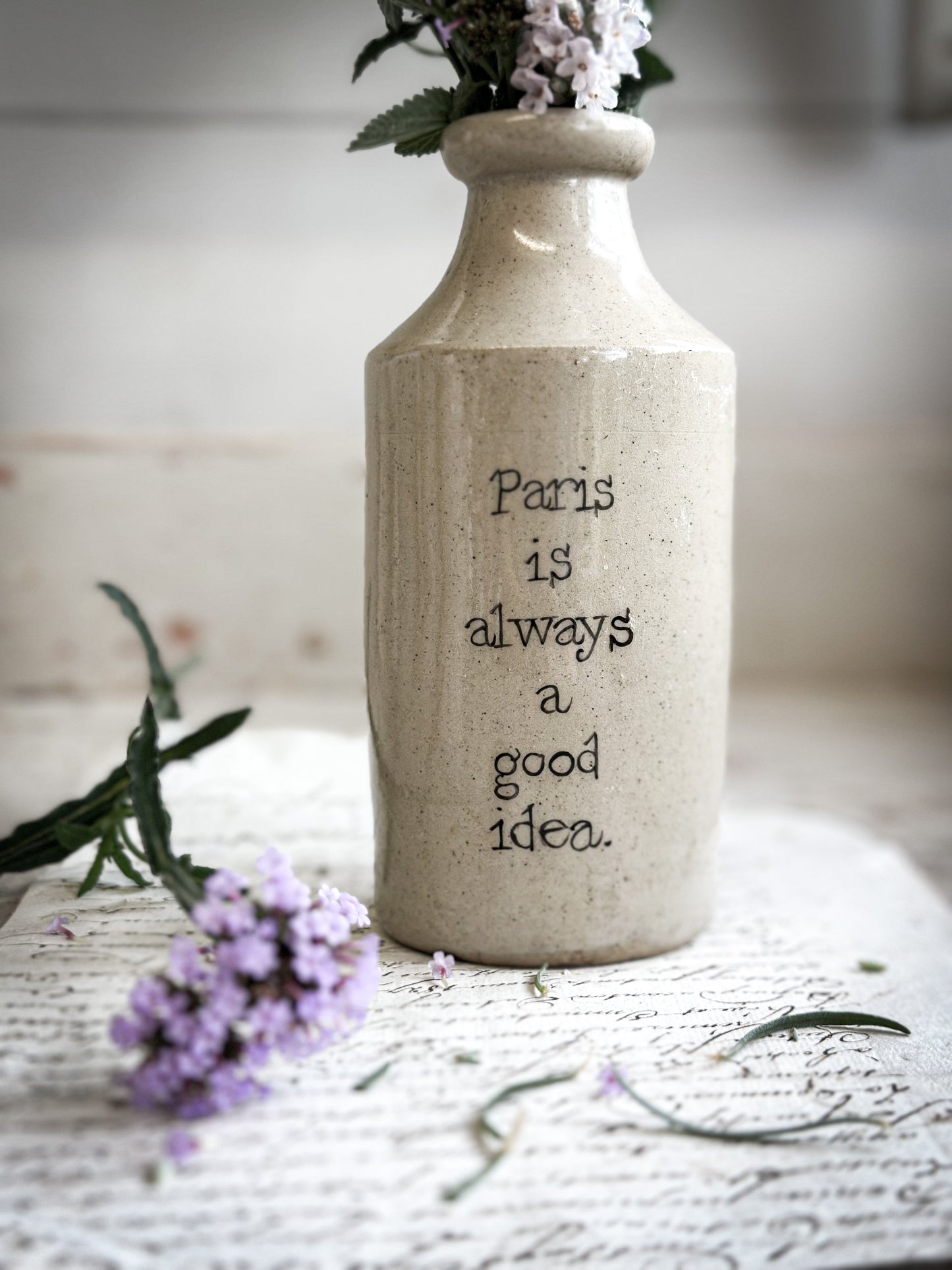 A Victorian unearthed short stoneware pottery bottle with a hand painted quote