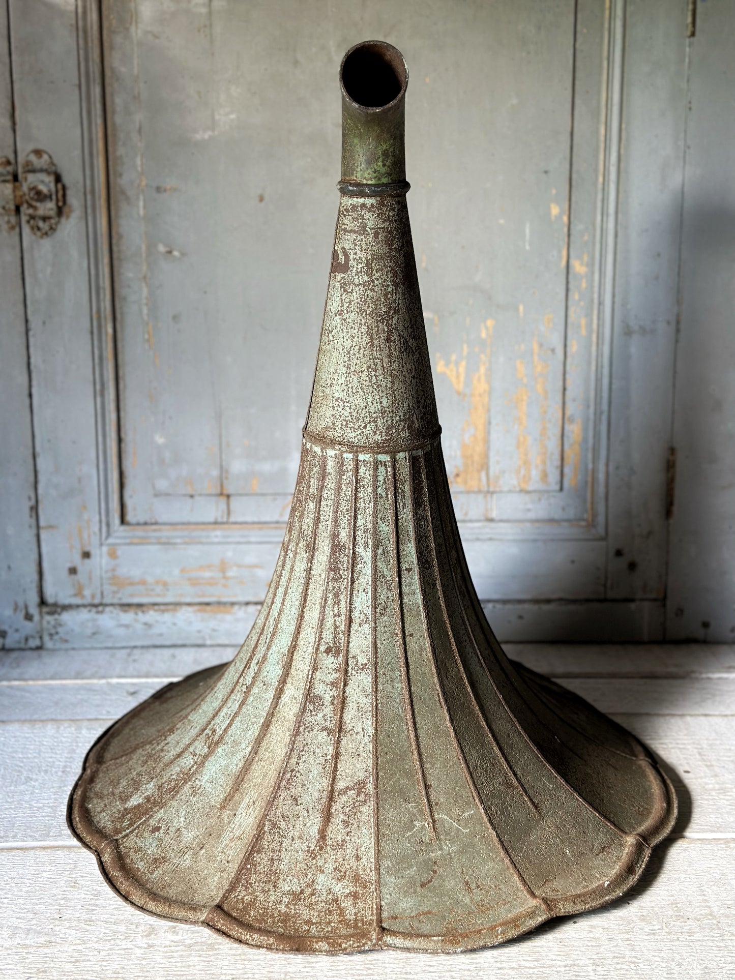 A wonderful antique French tin gramophone funnel and elbow