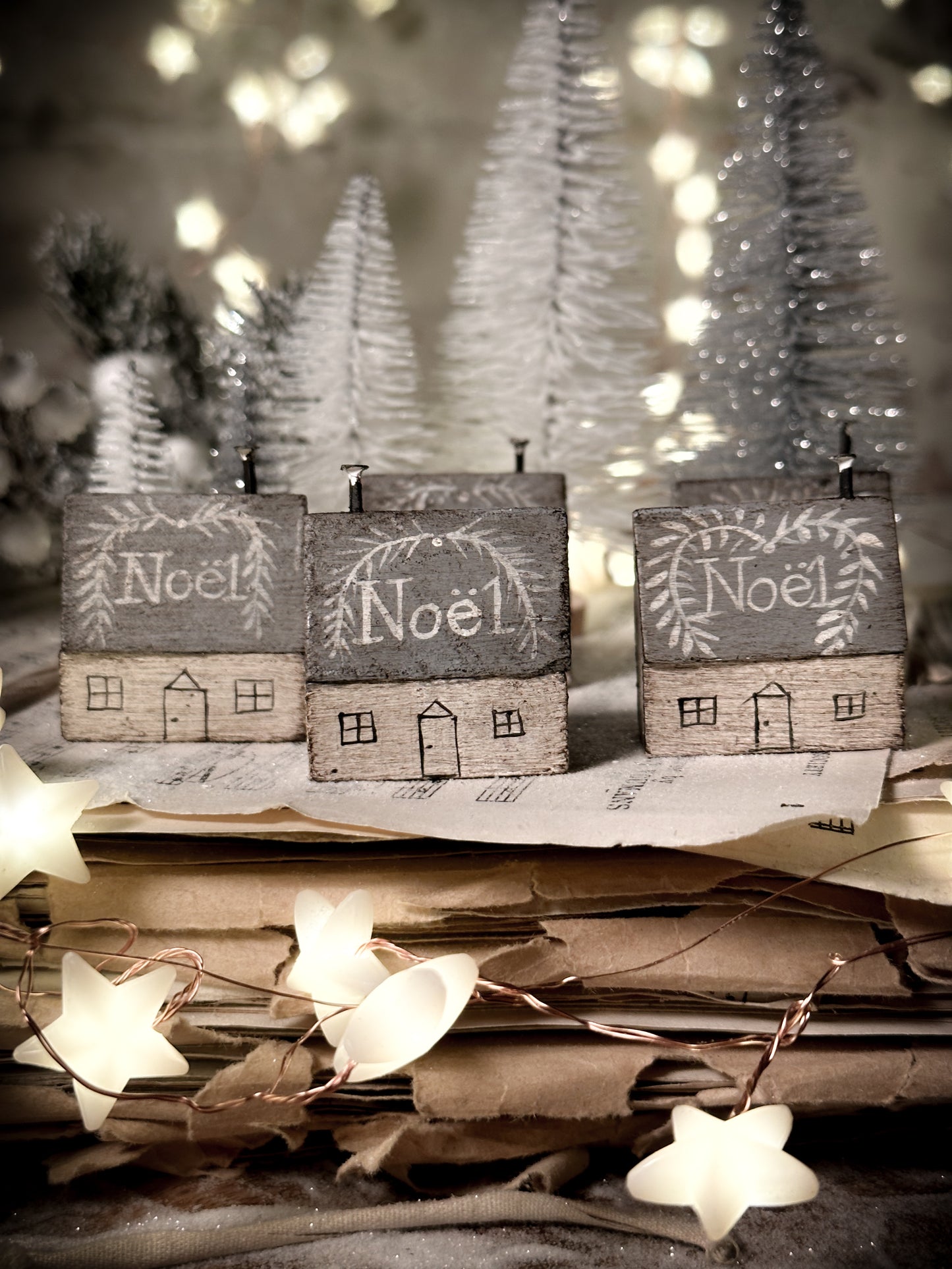 A pretty vintage German Erzgebirge Putz wooden village house painted with a Christmas quote