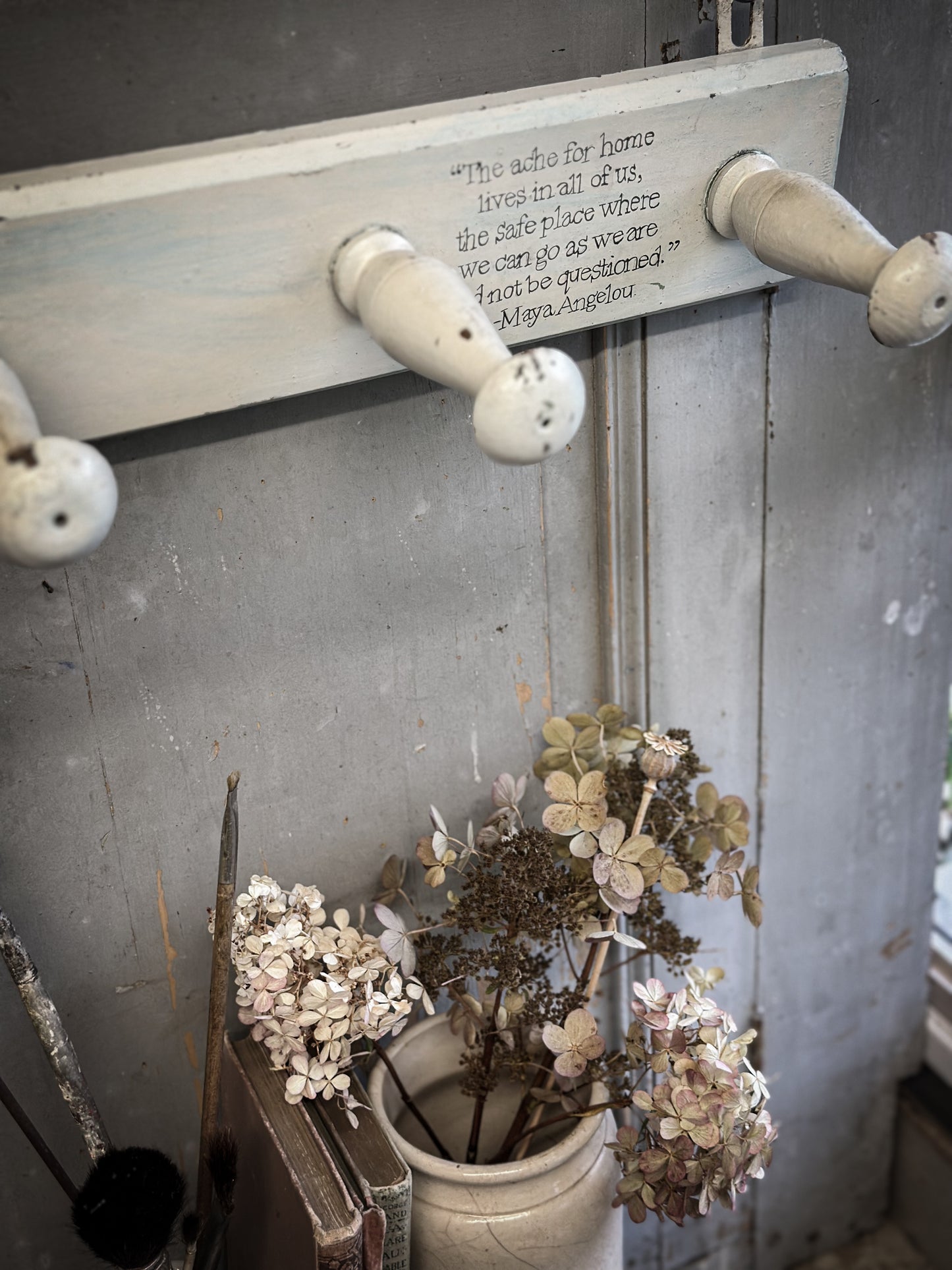 A Vintage Wooden French Coat Peg With Hand Painted Quote