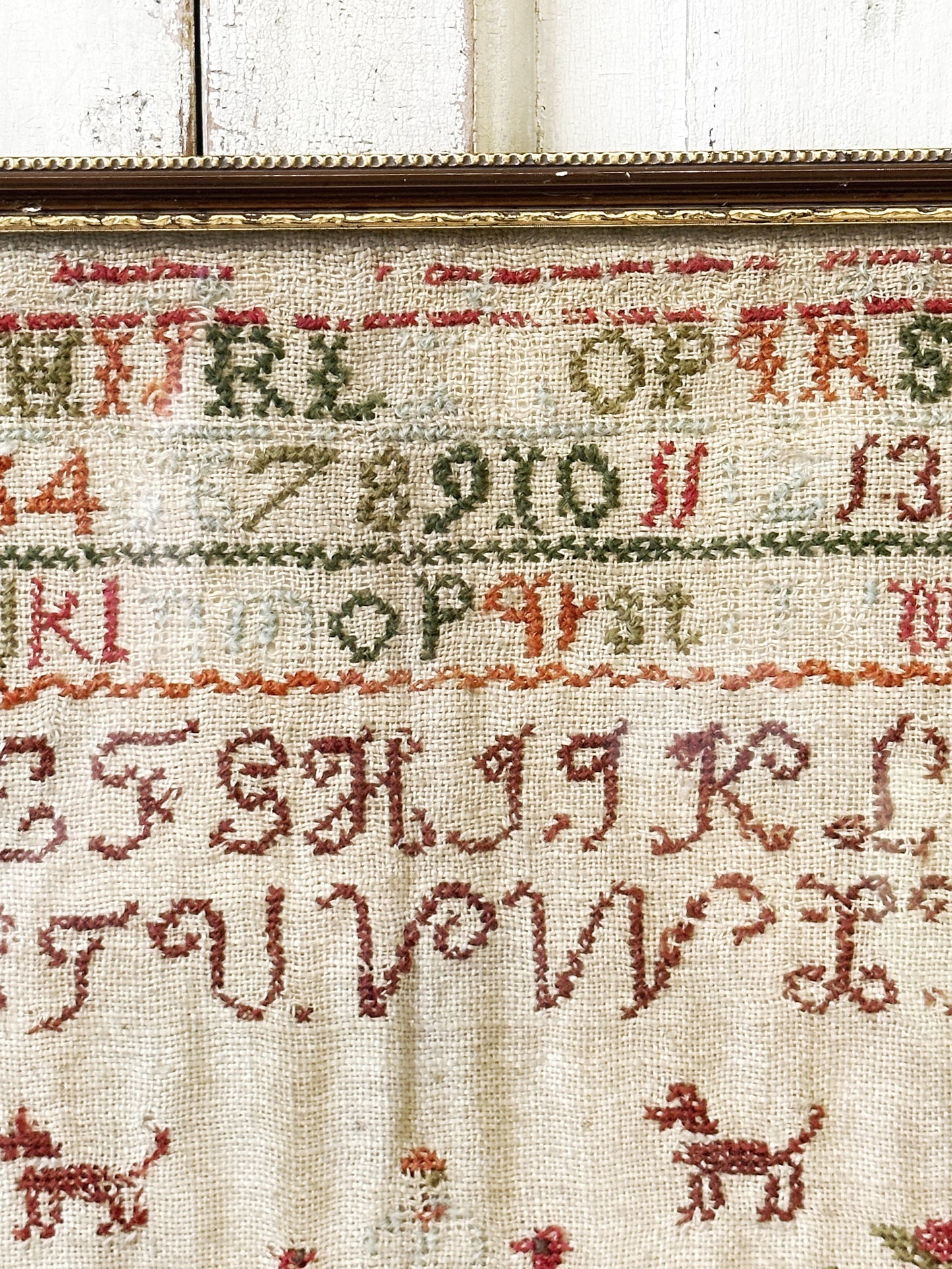 A beautiful 19th century colourful antique needlework sampler