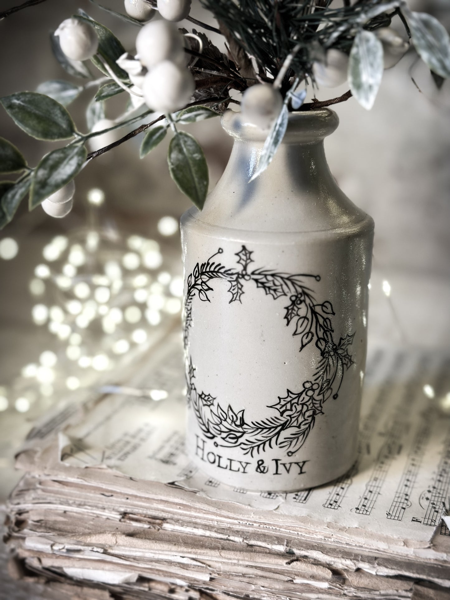 A hand painted and illustrated vintage Victorian bottle