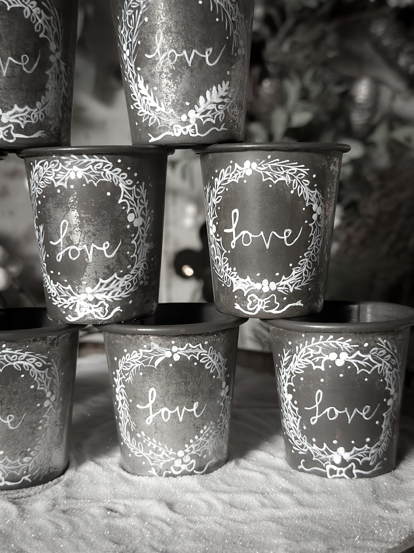 A pretty hand painted Dariole tin tea light holder