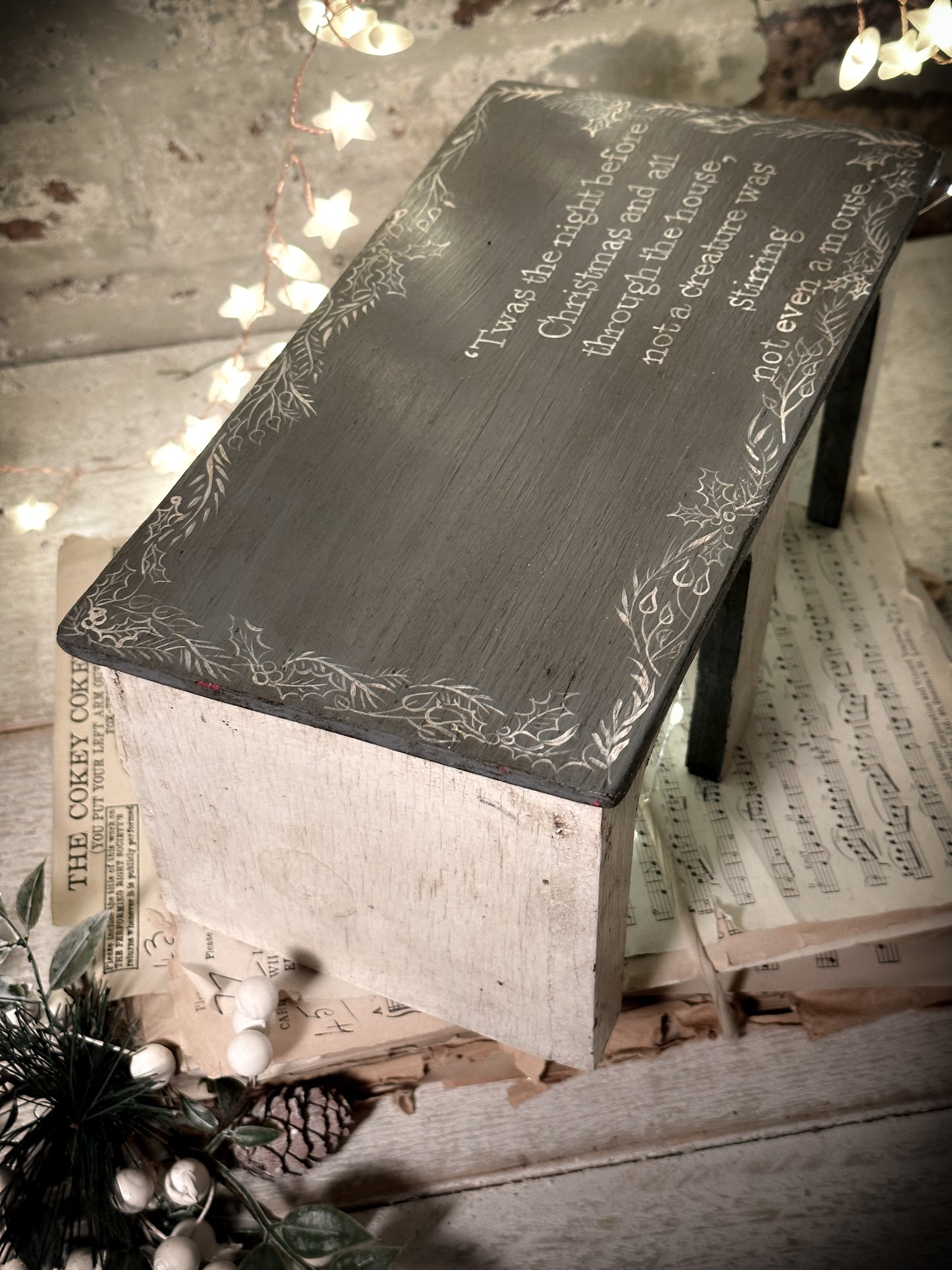 A hand painted quote on a vintage scratch built folk art model farm barn
