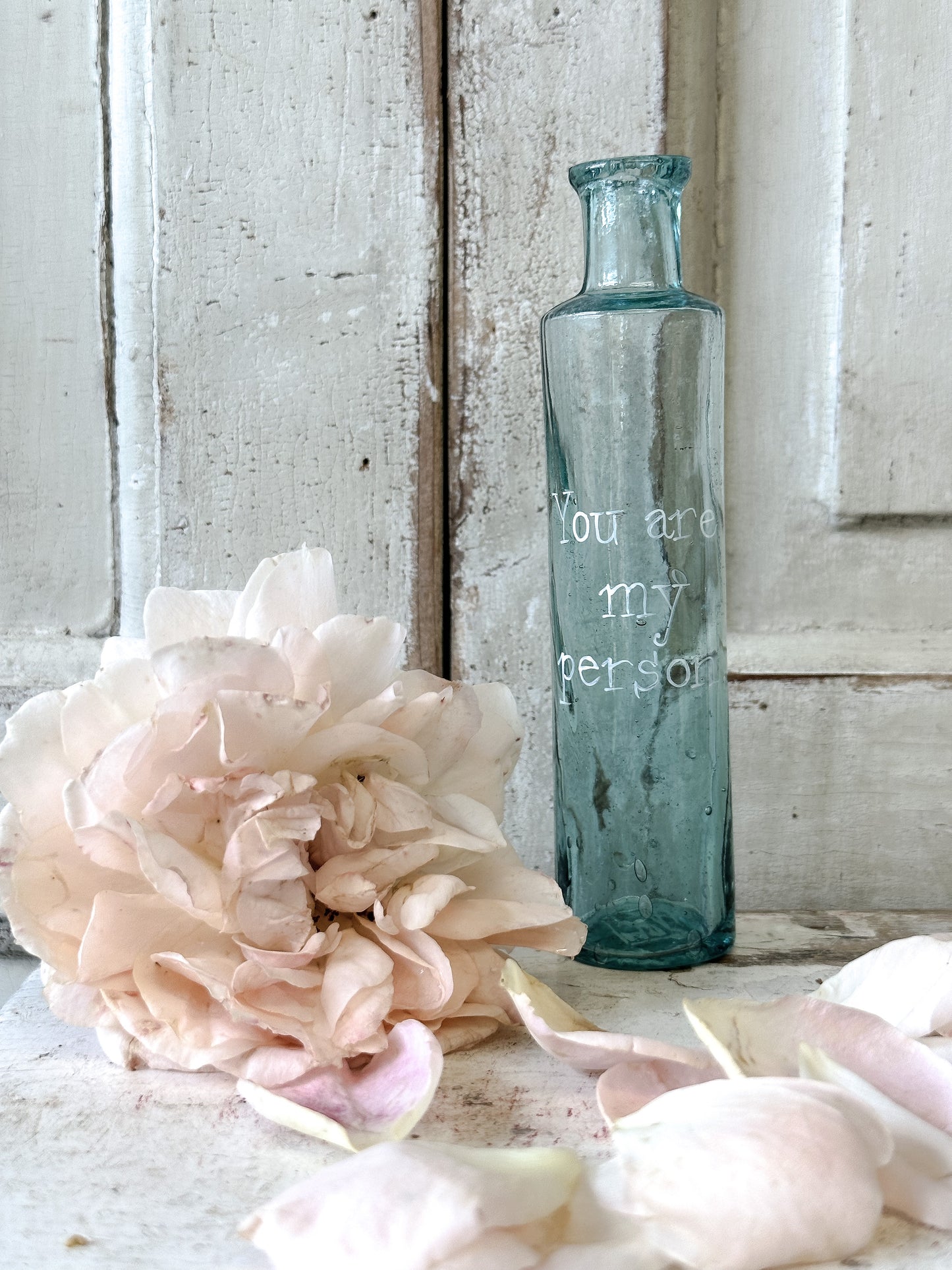 A beautiful Victorian bottle with a hand painted quote