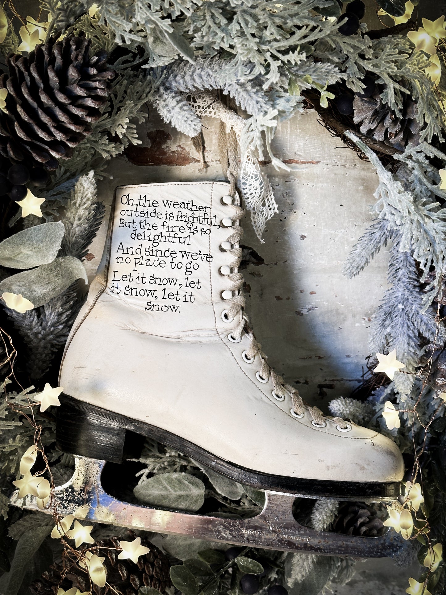 A beautiful vintage Christmas ice skate hand painted using traditional sign writer’s techniques and materials