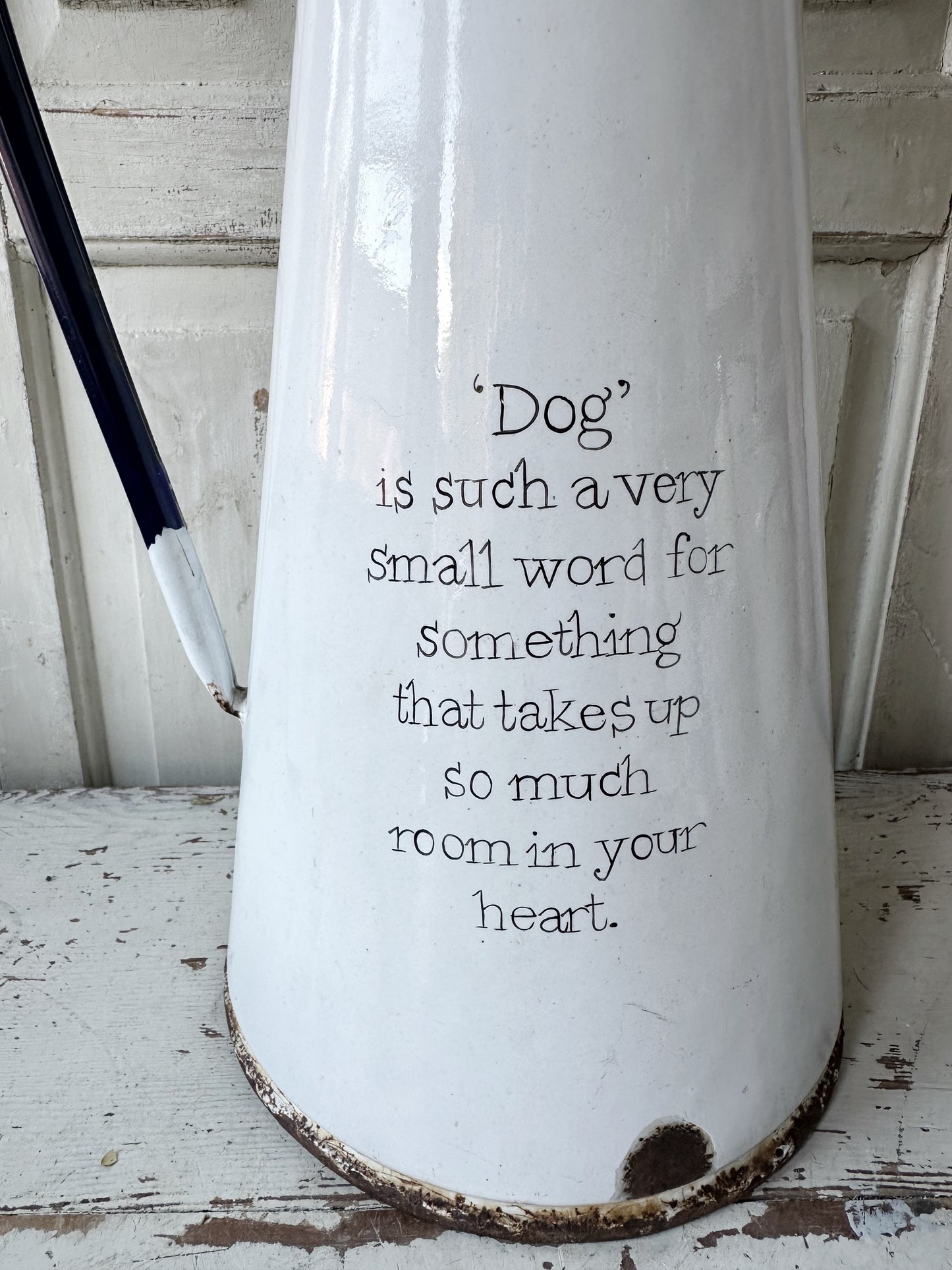 A hand painted quote on a beautiful Vintage white enamelware jug