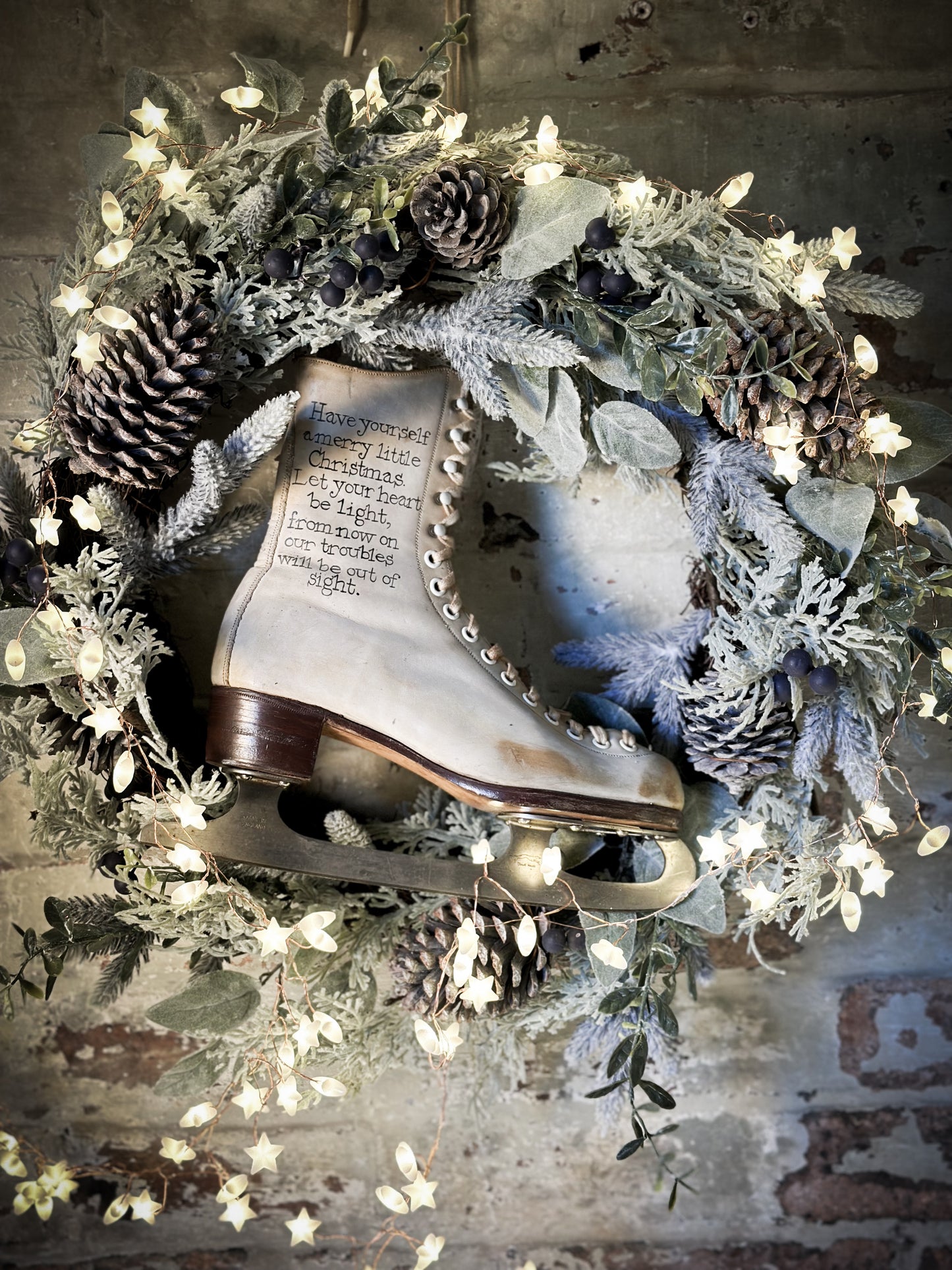 A beautiful vintage Christmas ice skate hand painted using traditional sign writer’s techniques and materials