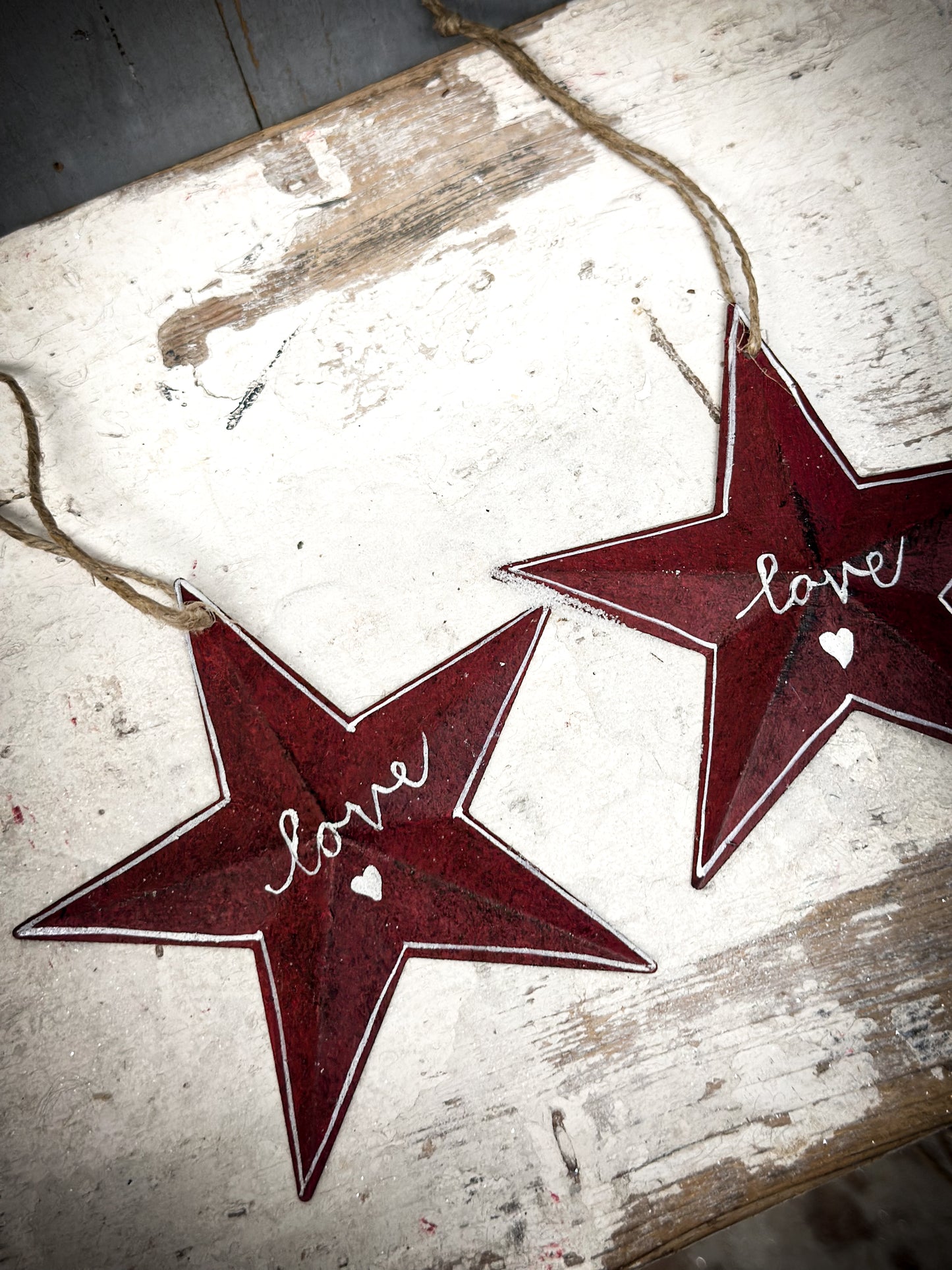 A Large Red Tin Barn Star Christmas Decoration “Love”