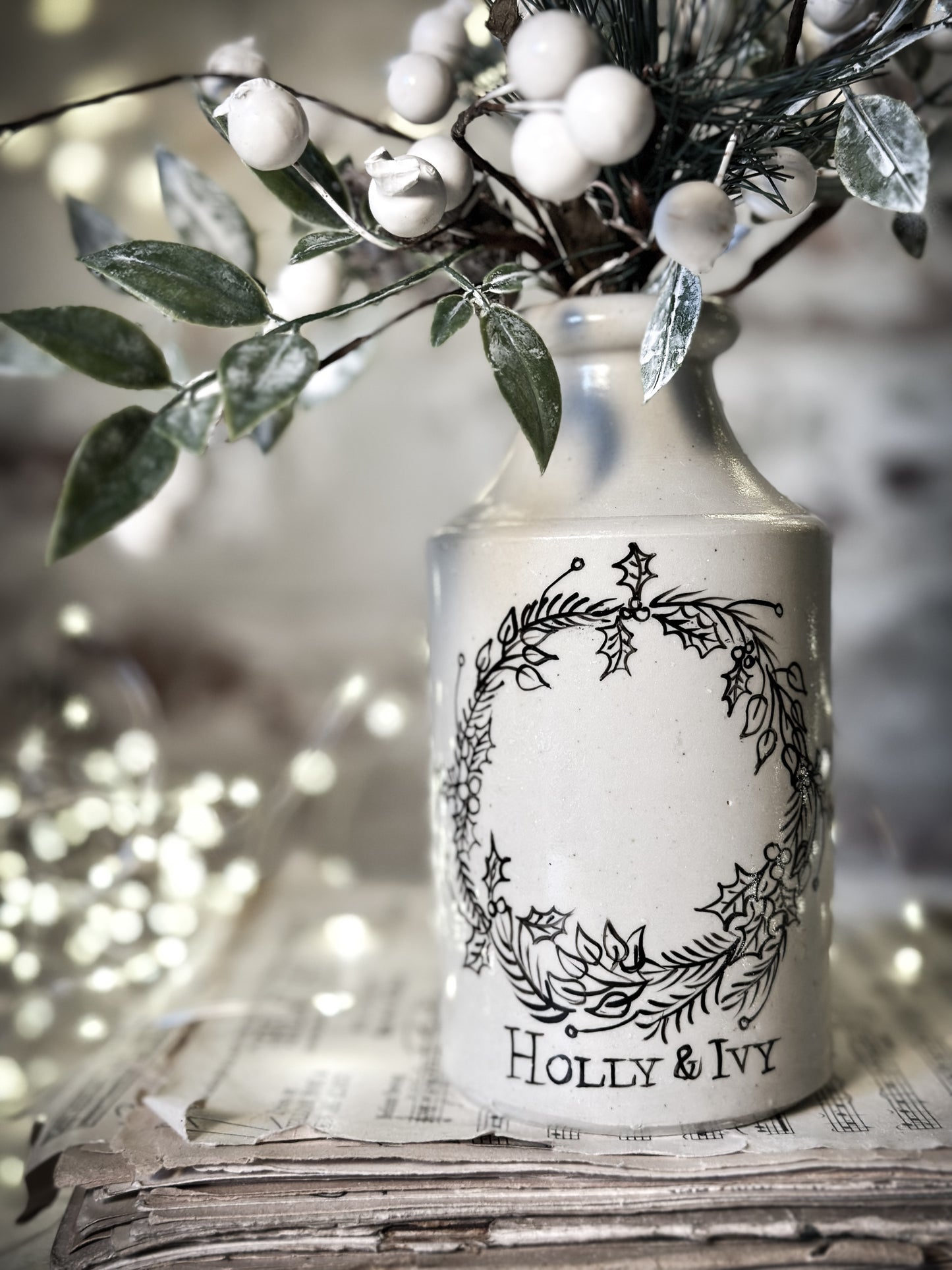 A hand painted and illustrated vintage Victorian bottle