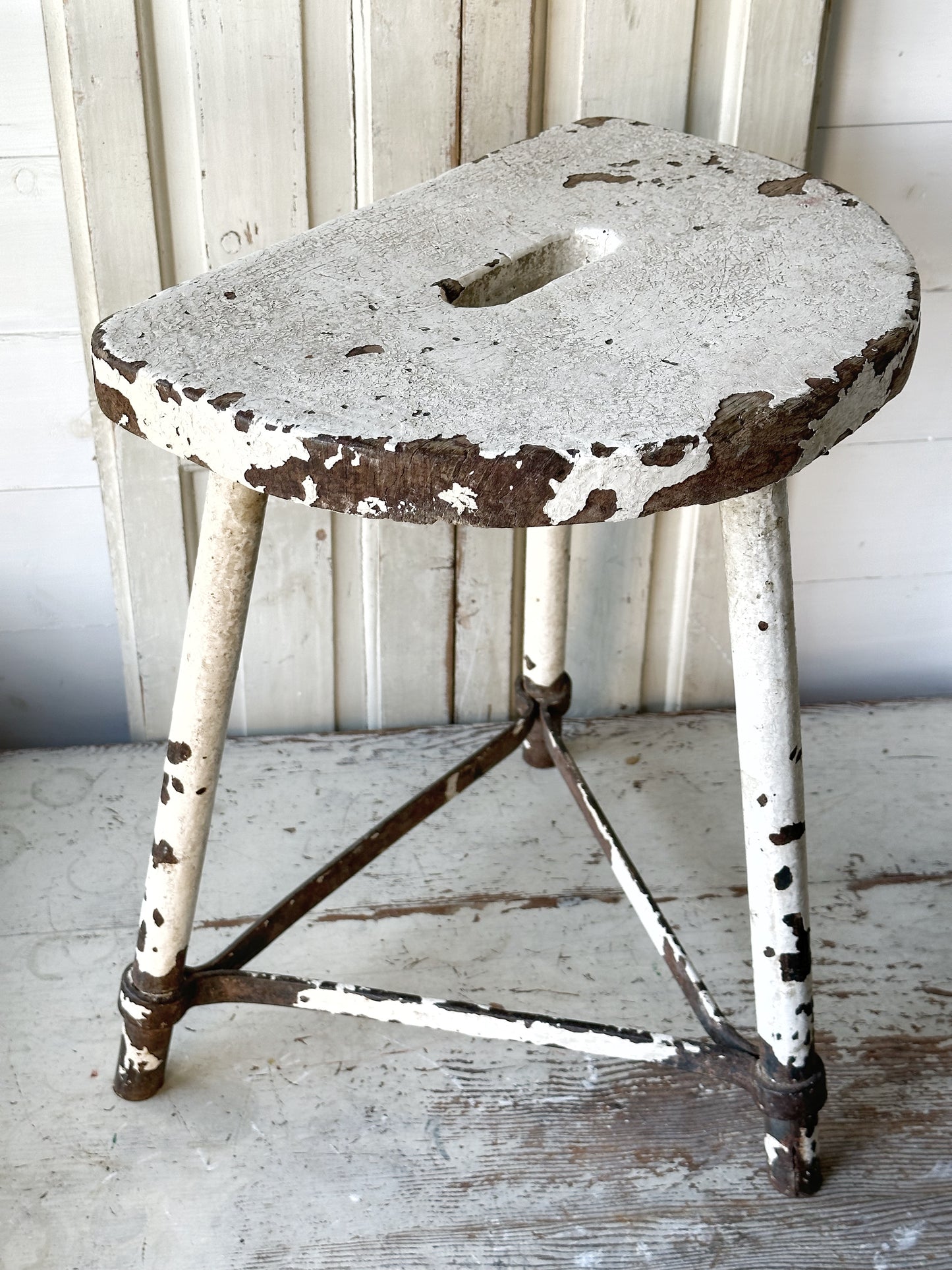 A chippy white French engineer’s stool 1930’s