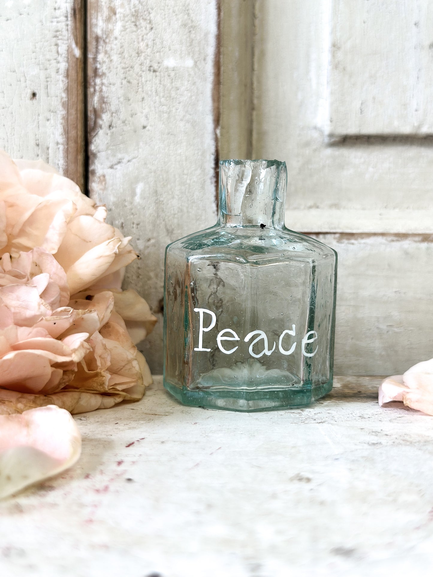 A beautiful Victorian bottle with a hand painted quote