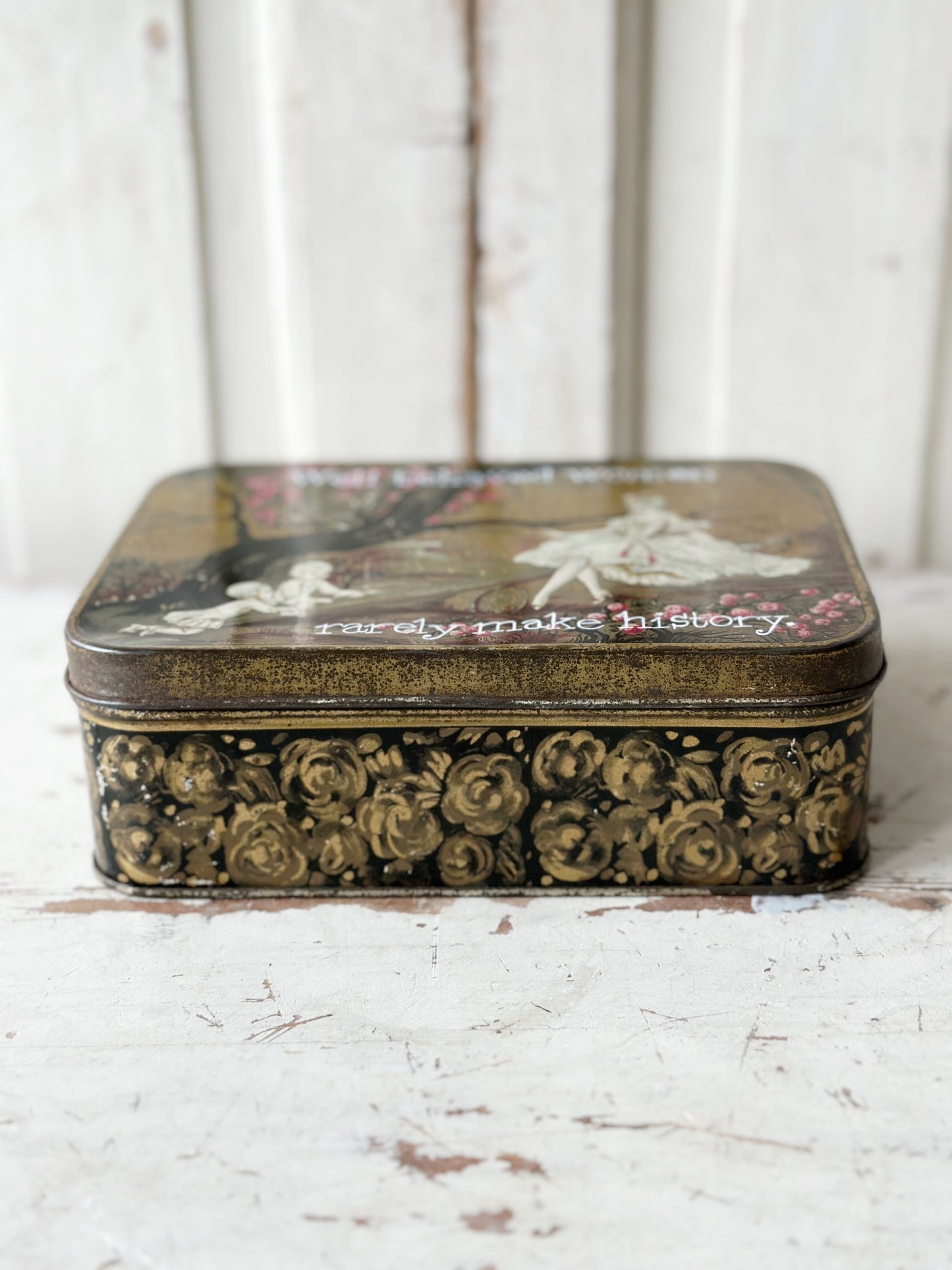 A pretty antique tin with a hand painted quote.