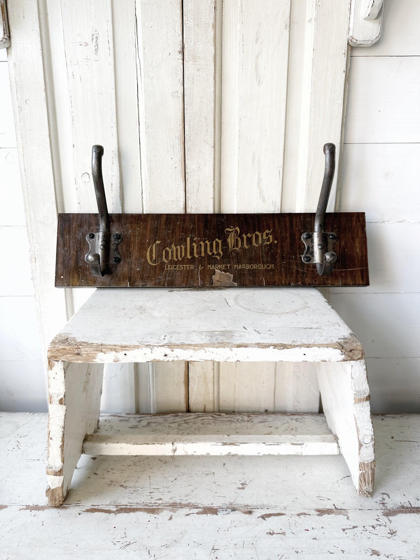 Salvaged sign written drawer front coat pegs