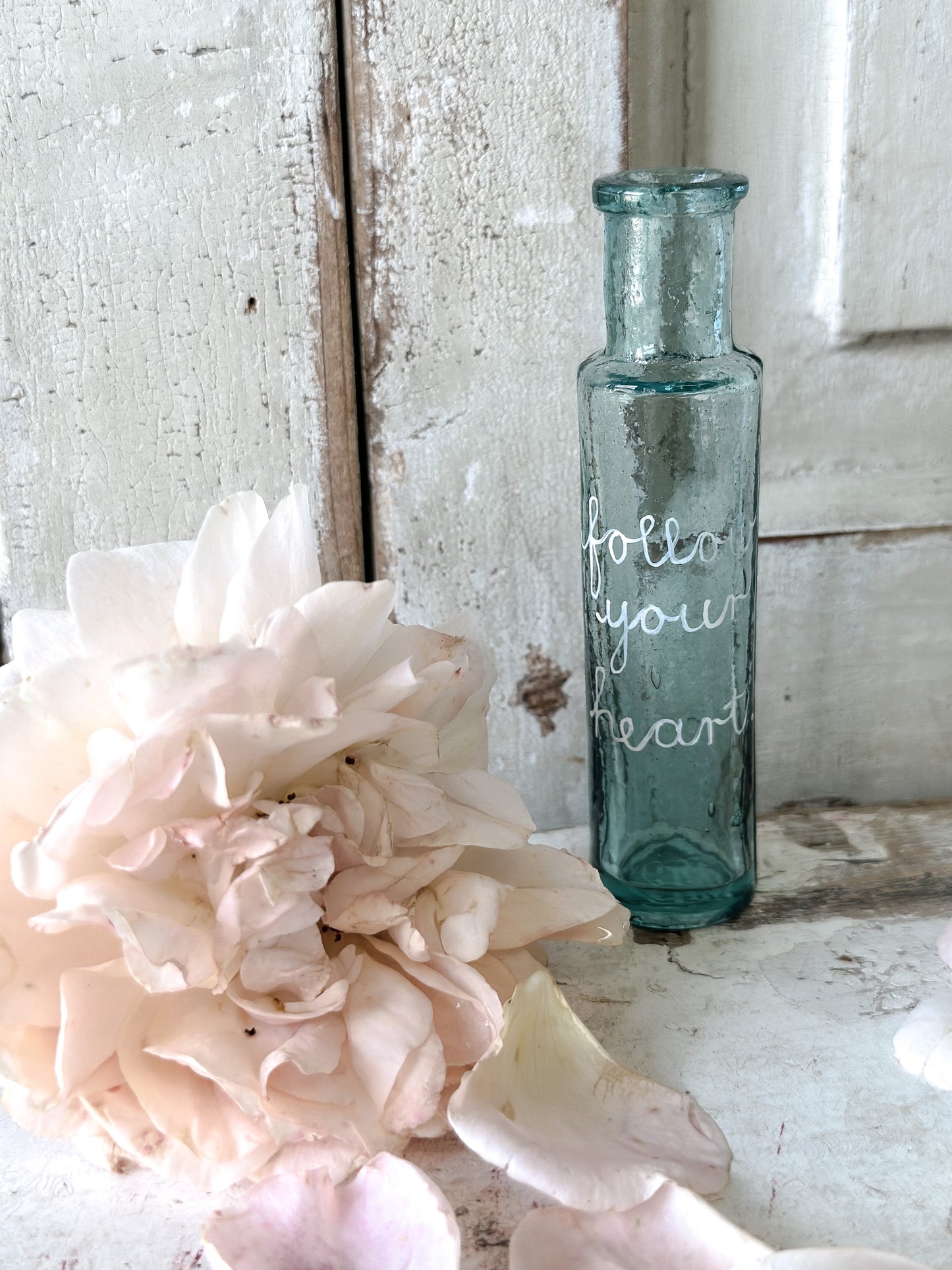 A beautiful Victorian bottle with a hand painted quote