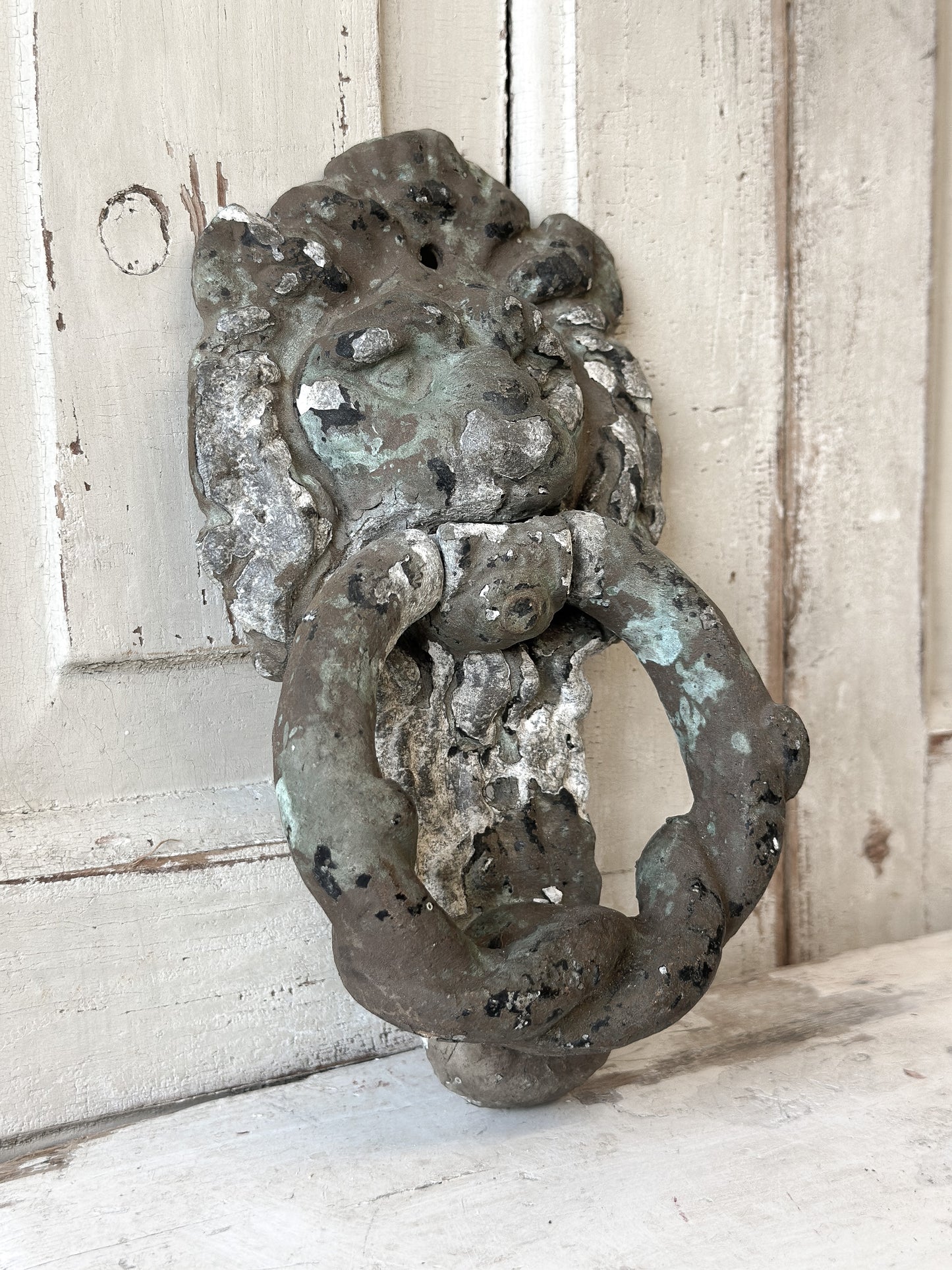 Beautiful weathered lion knocker