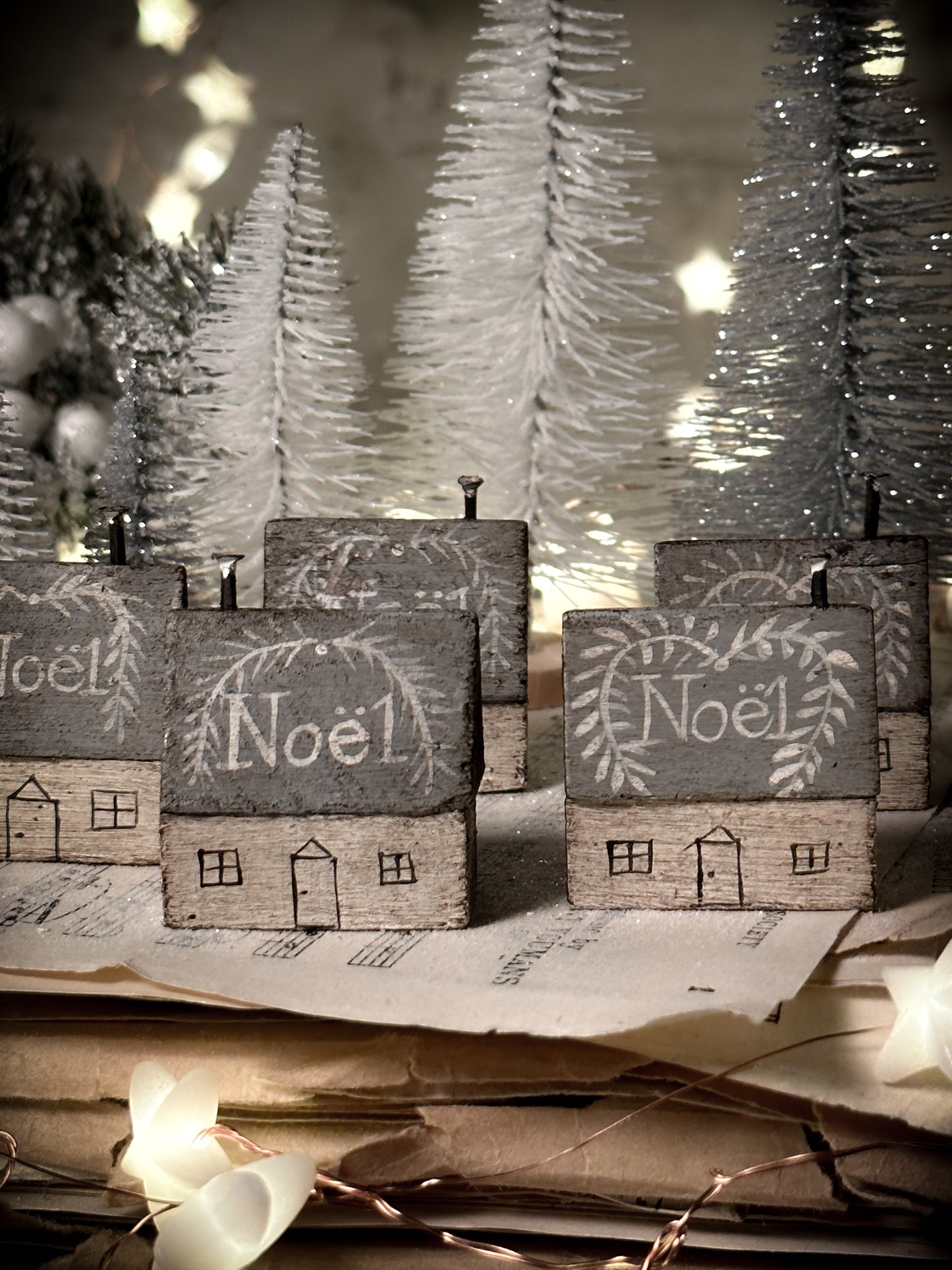 A pretty vintage German Erzgebirge Putz wooden village house painted with a Christmas quote