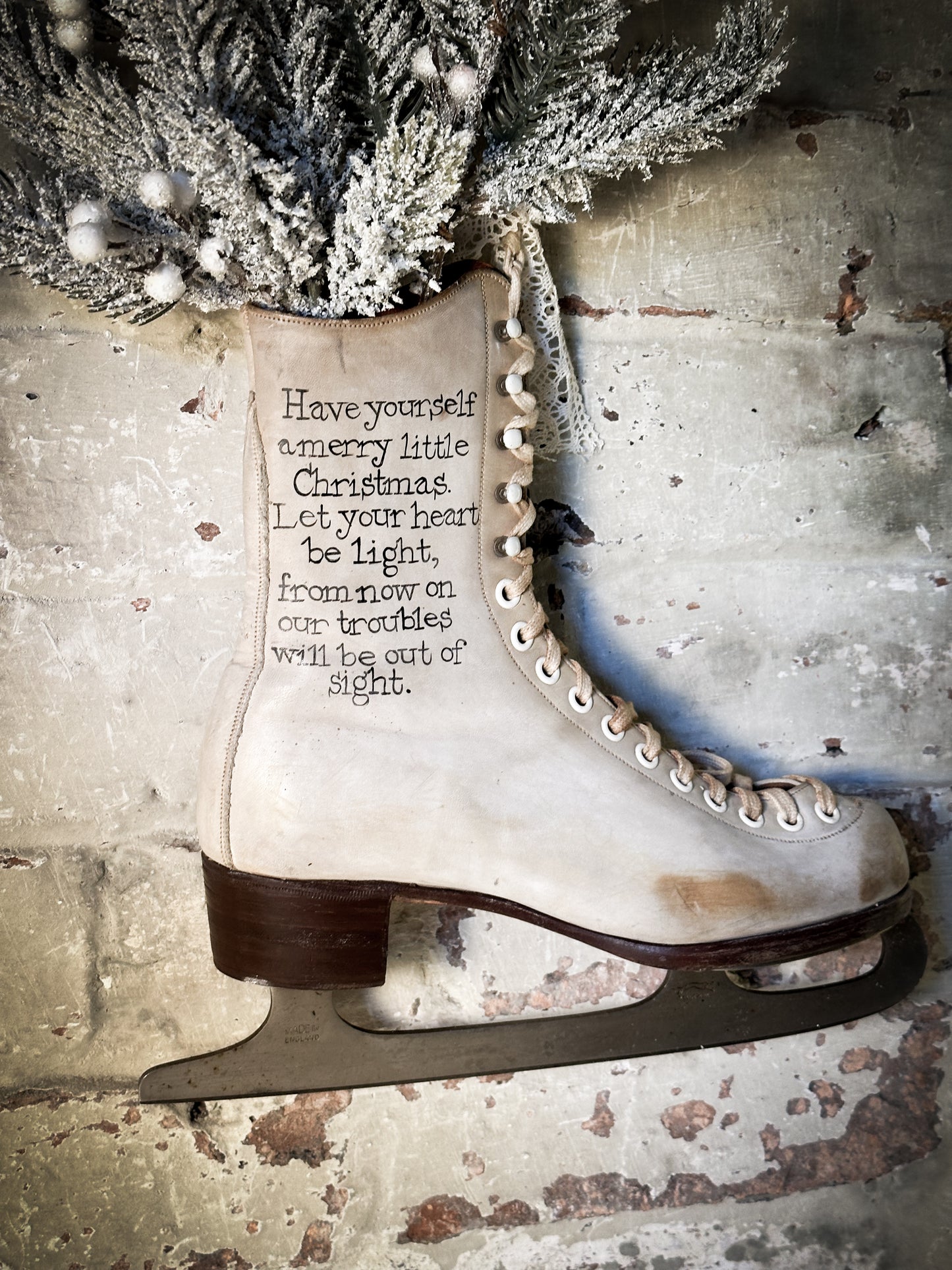 A beautiful vintage Christmas ice skate hand painted using traditional sign writer’s techniques and materials
