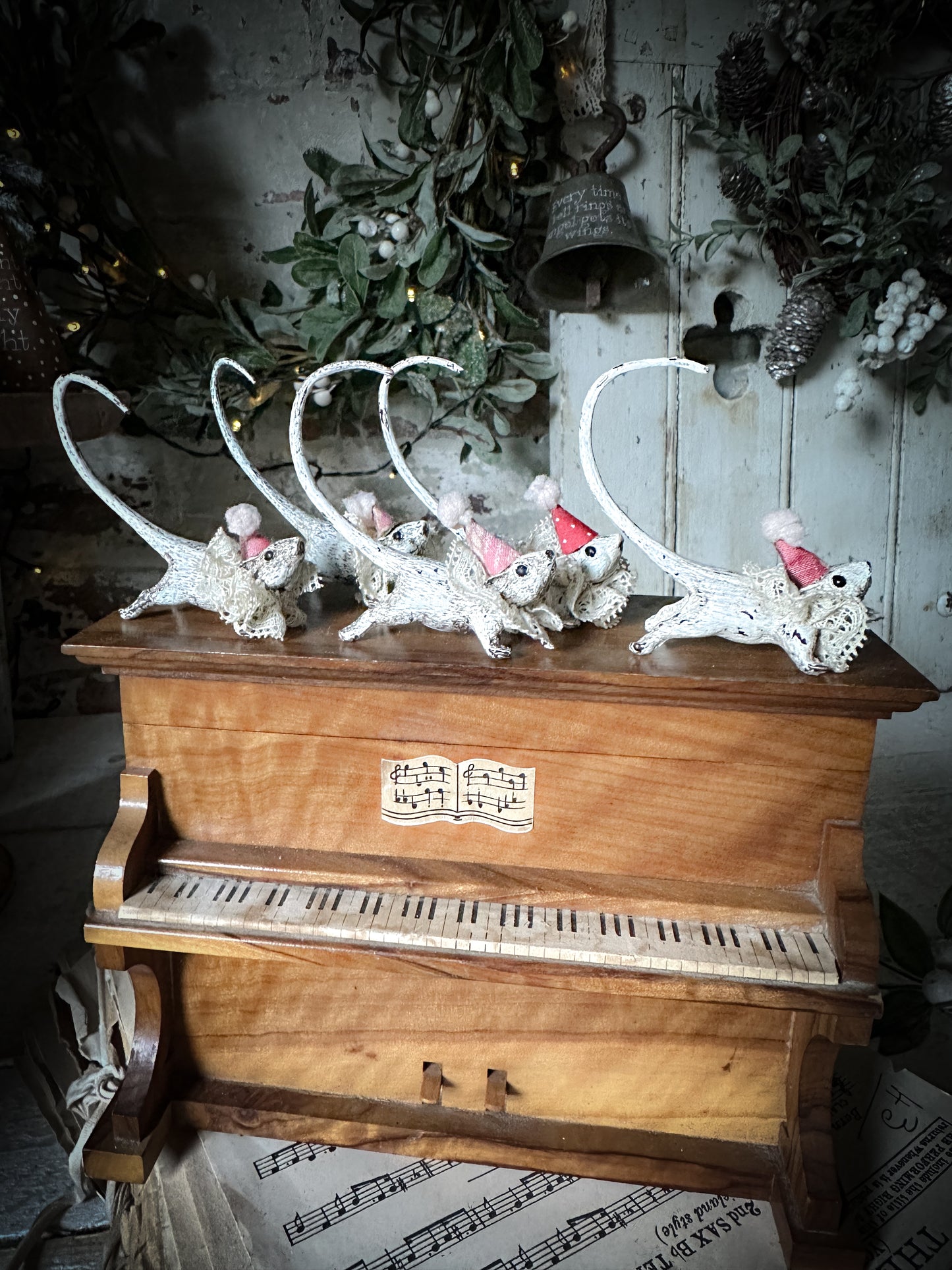 A cold painted brass “night before Christmas mouse” with a lace ruffle and Christmas hat