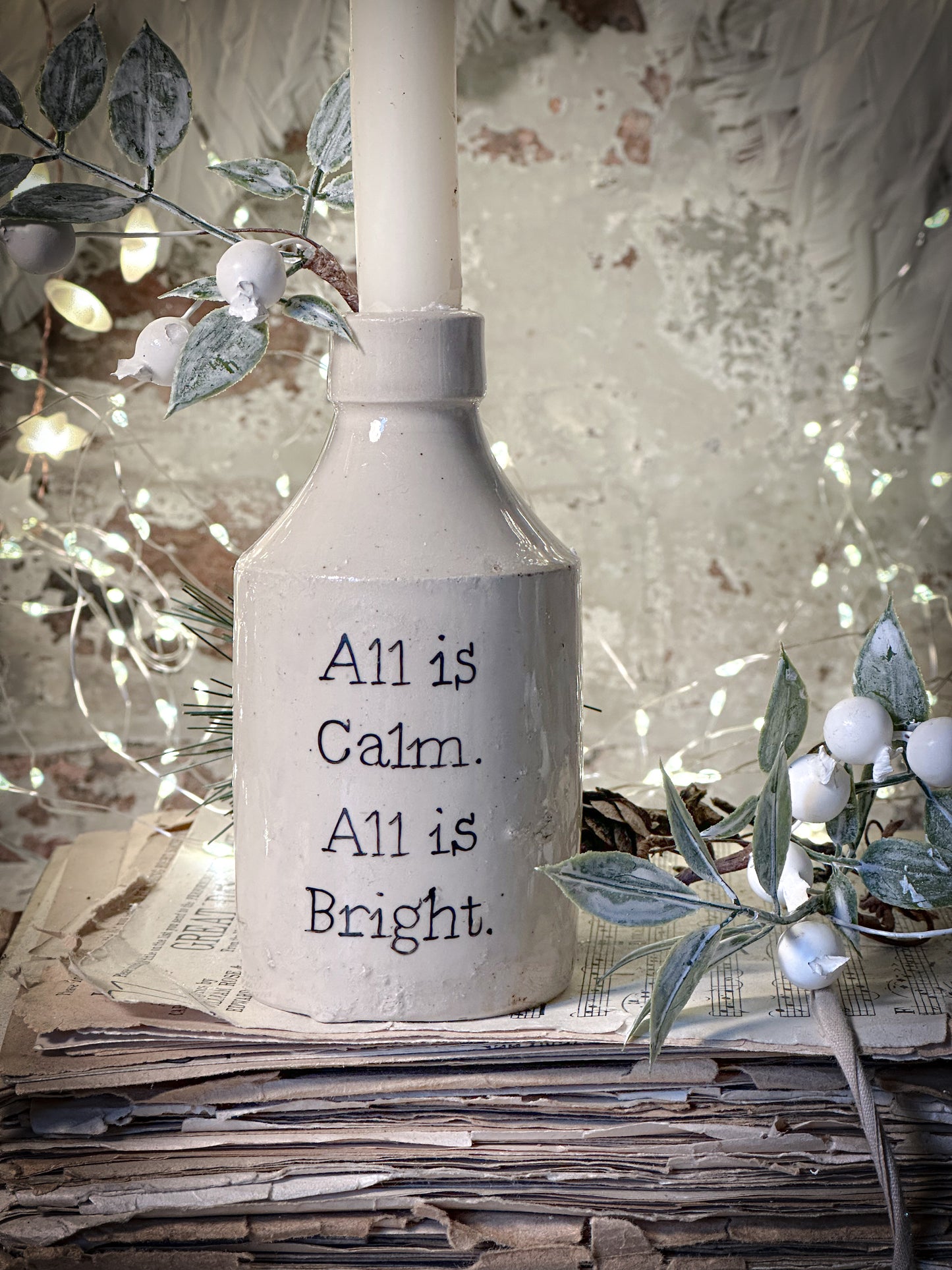 A hand painted vintage Victorian bottle or candle holder