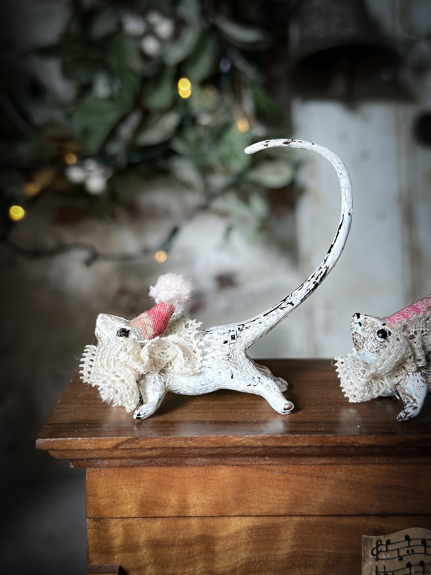 A cold painted brass “night before Christmas mouse” with a lace ruffle and Christmas hat