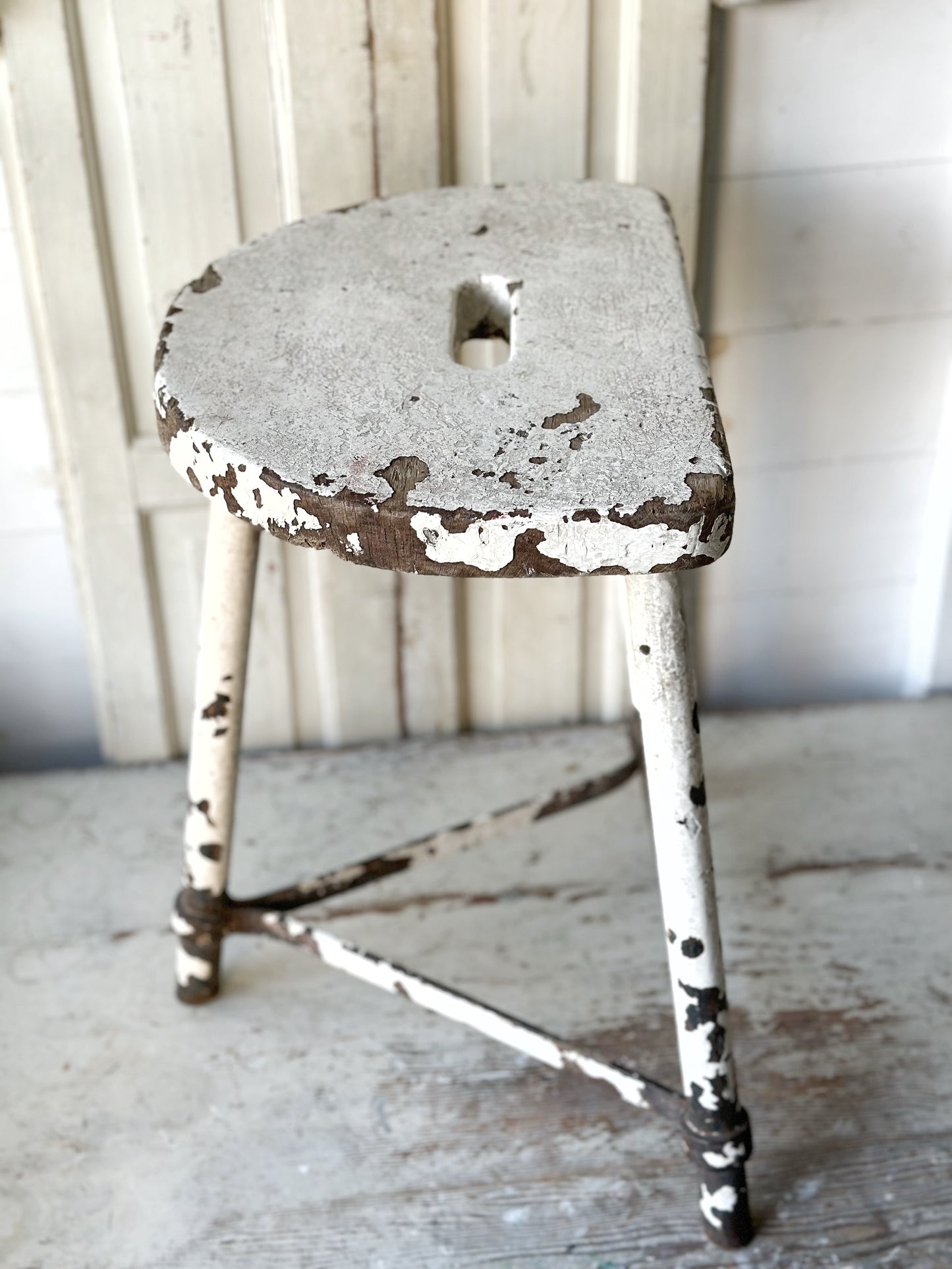 A chippy white French engineer’s stool 1930’s