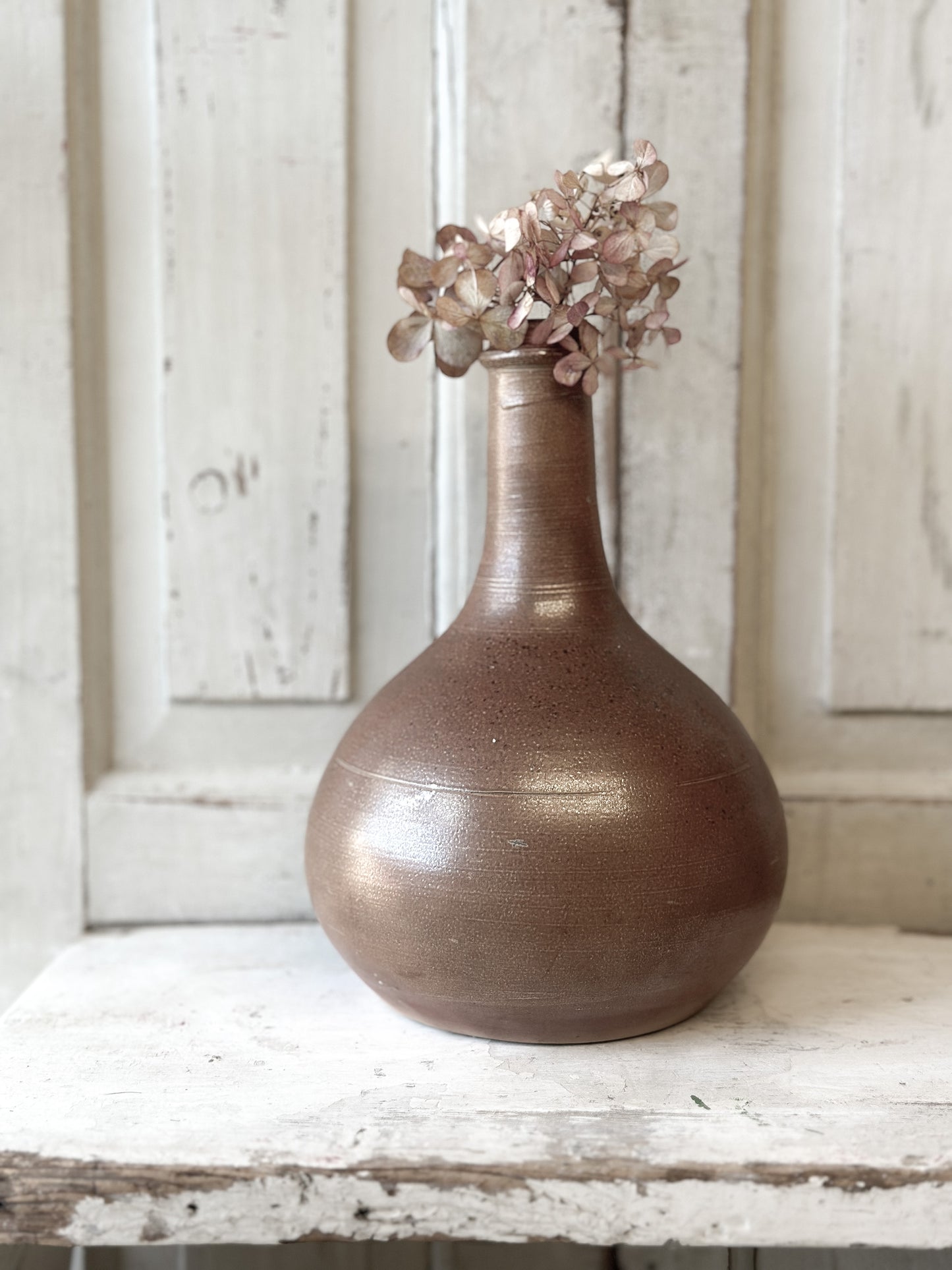 A wonderful antique French glazed wine bottle