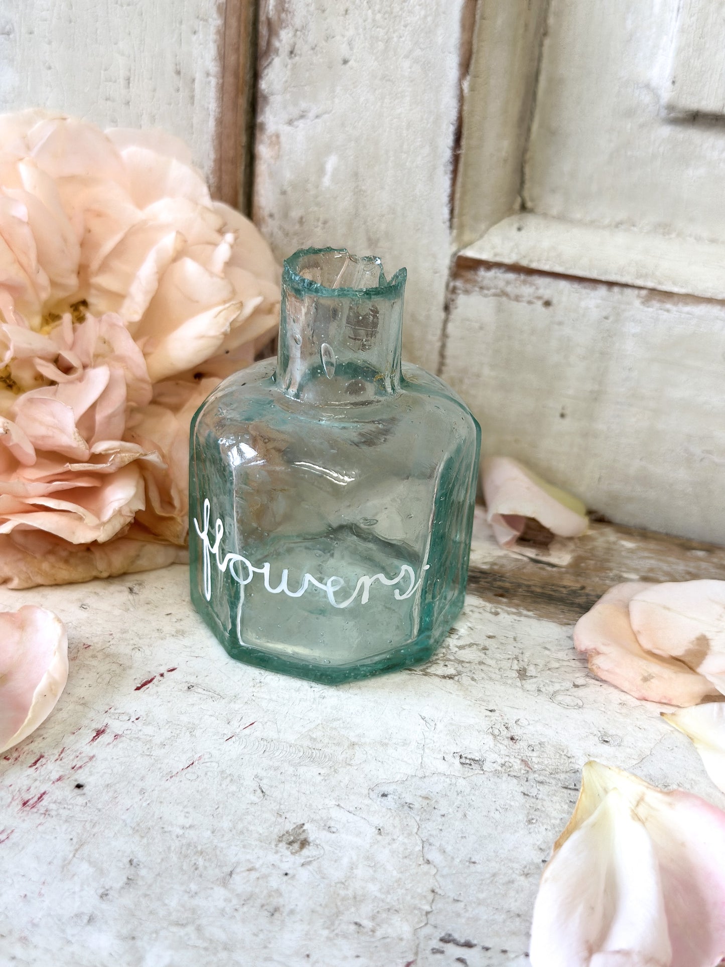 A beautiful Victorian bottle with a hand painted quote