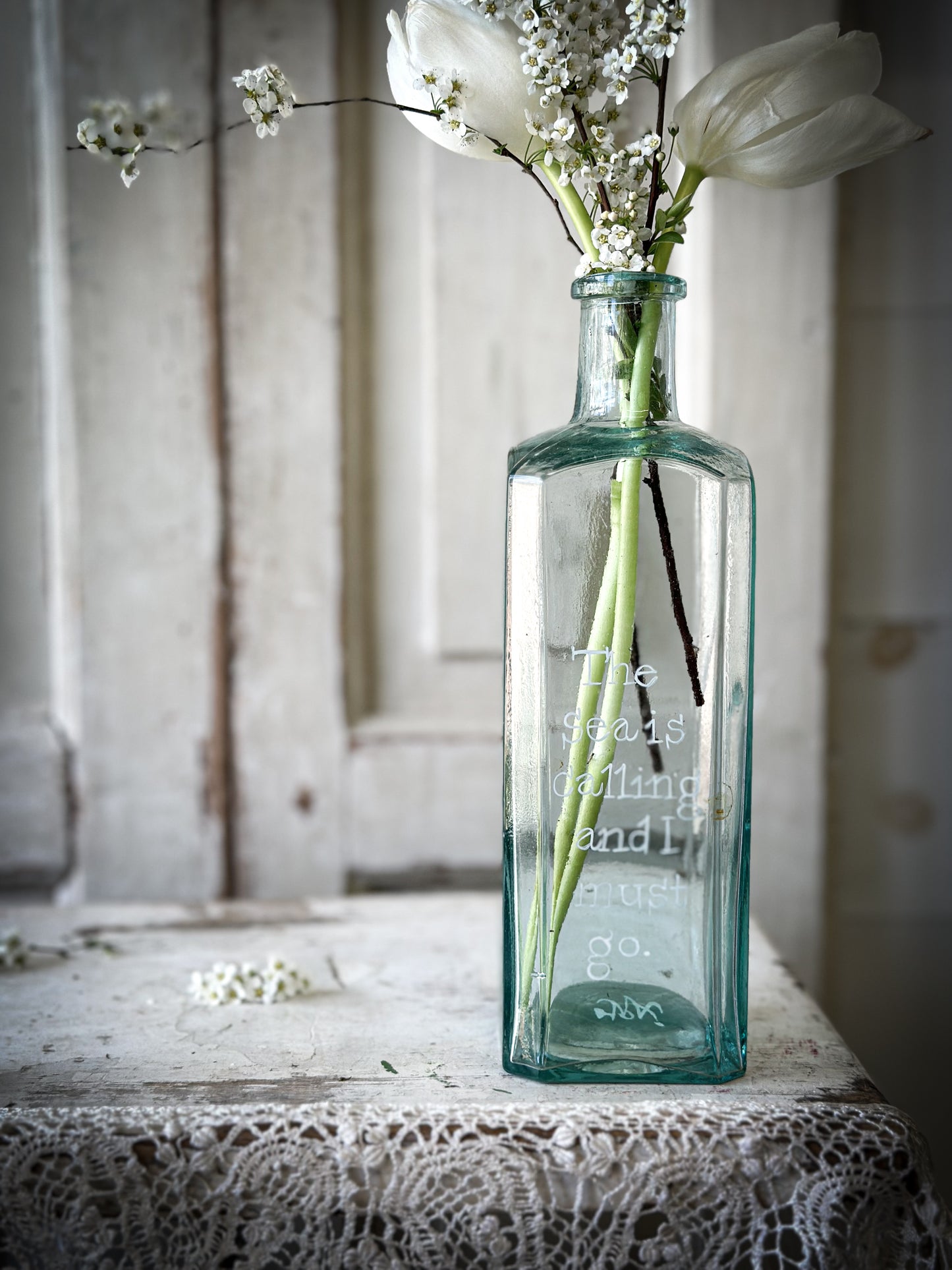 A beautiful tall Victorian glass bottle