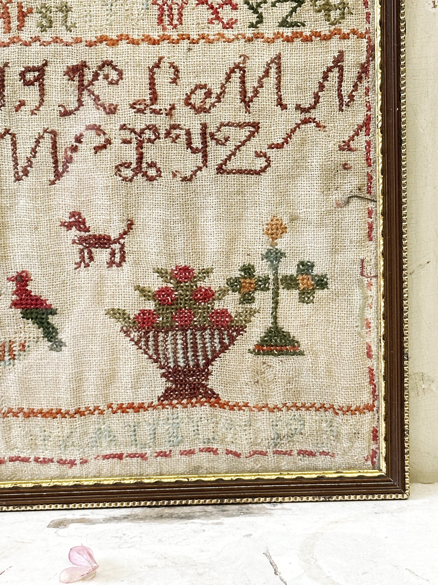 A beautiful 19th century colourful antique needlework sampler