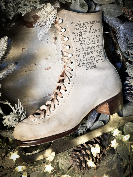 A beautiful vintage Christmas ice skate hand painted using traditional sign writer’s techniques and materials