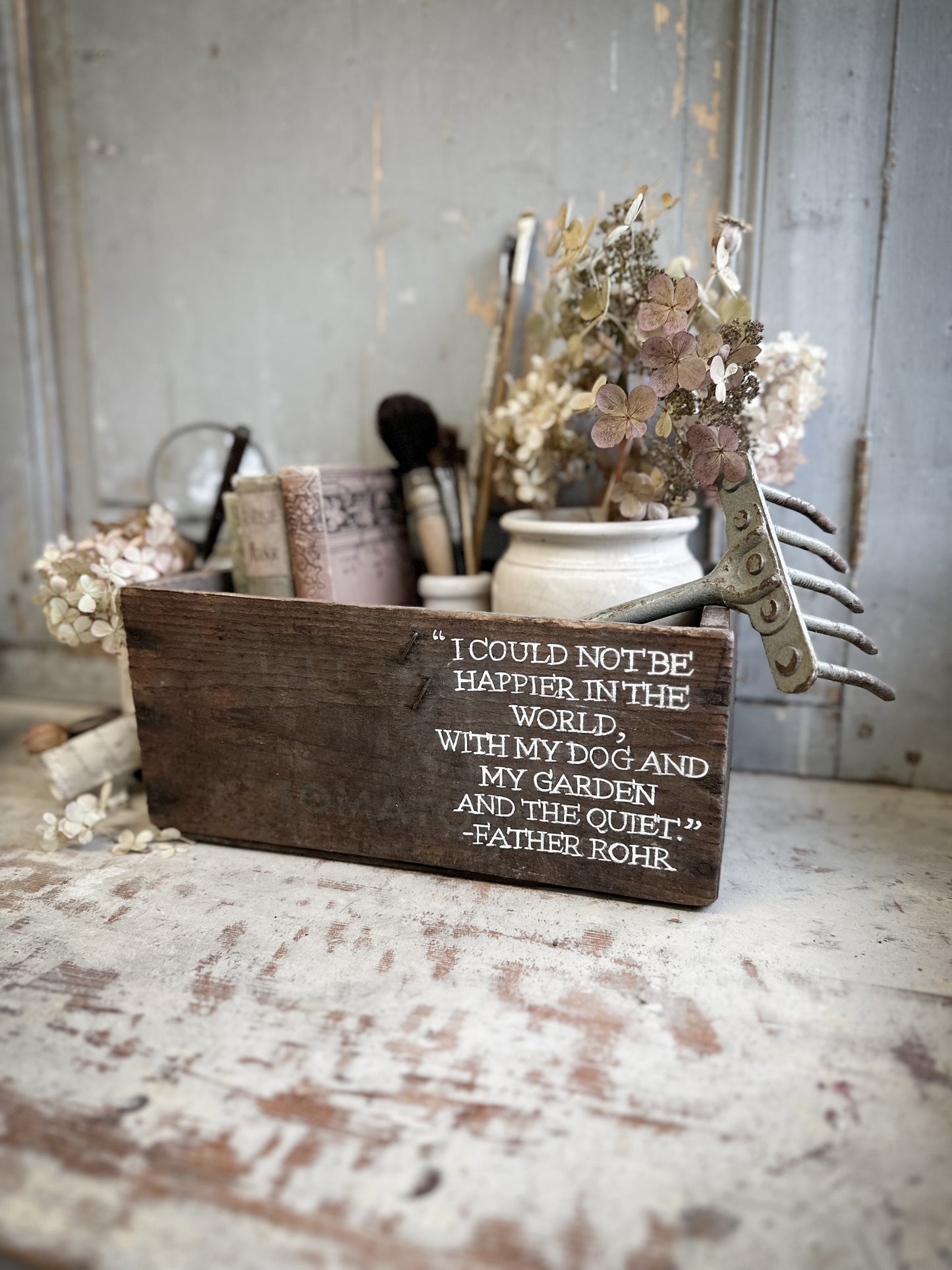 A Vintage Wooden Tomato Crate With Hand Painted Quote