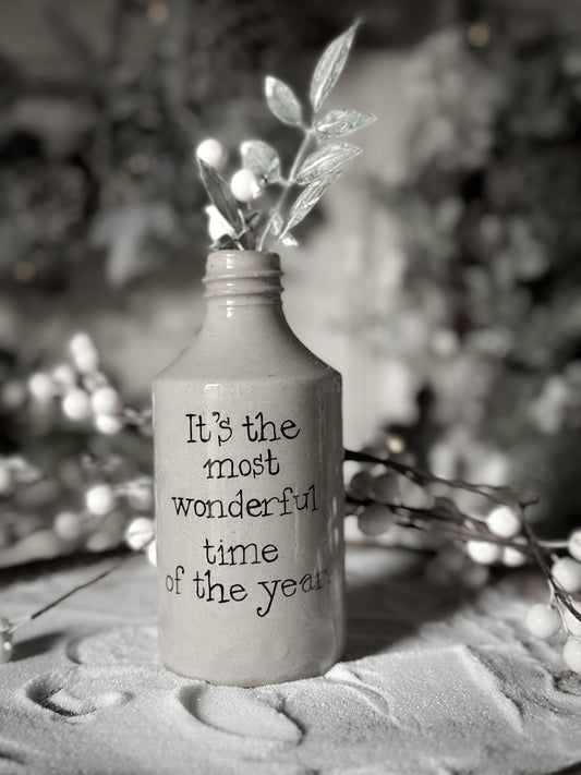 A Victorian unearthed stoneware pottery tall bottle with a hand painted quote