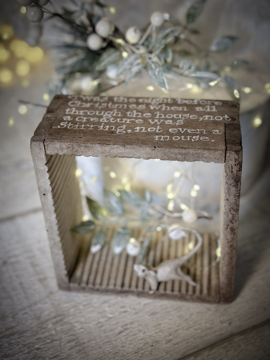 A painted French cheese mould Christmas display