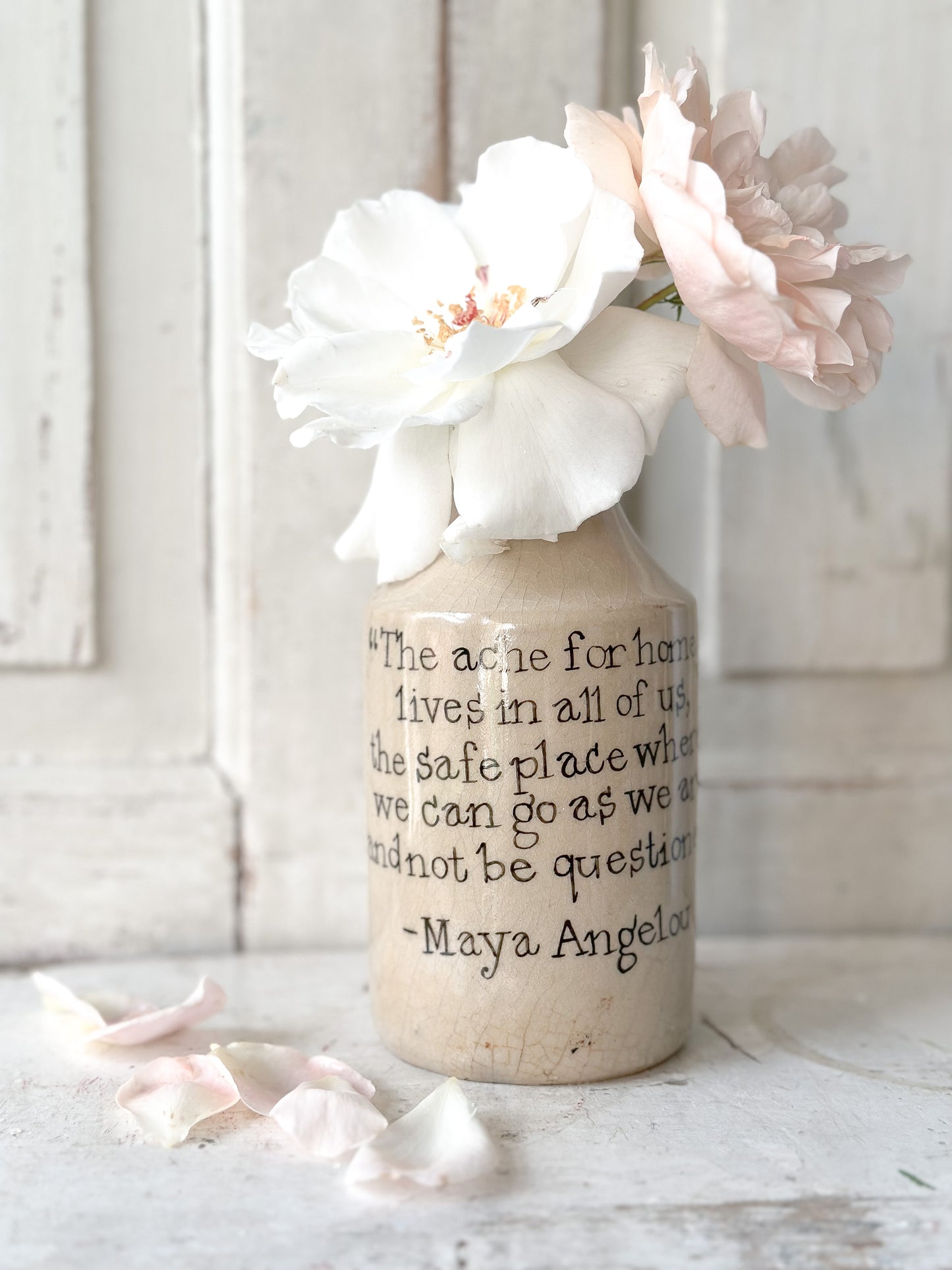 A Victorian unearthed stoneware pottery bottle with a hand painted quote
