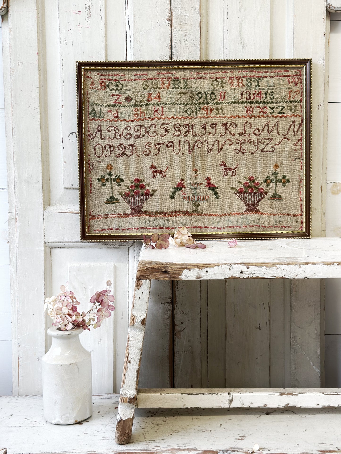 A beautiful 19th century colourful antique needlework sampler