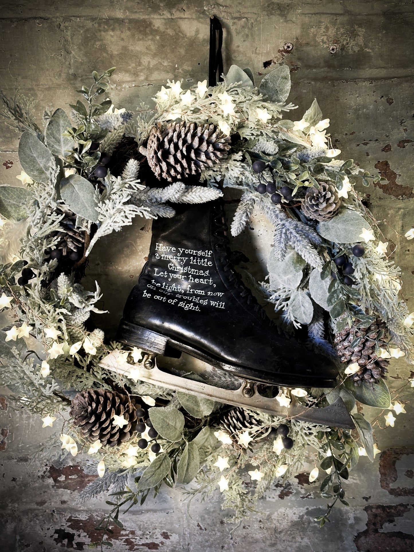 A beautiful vintage Christmas ice skate hand painted using traditional sign writer’s techniques and materials