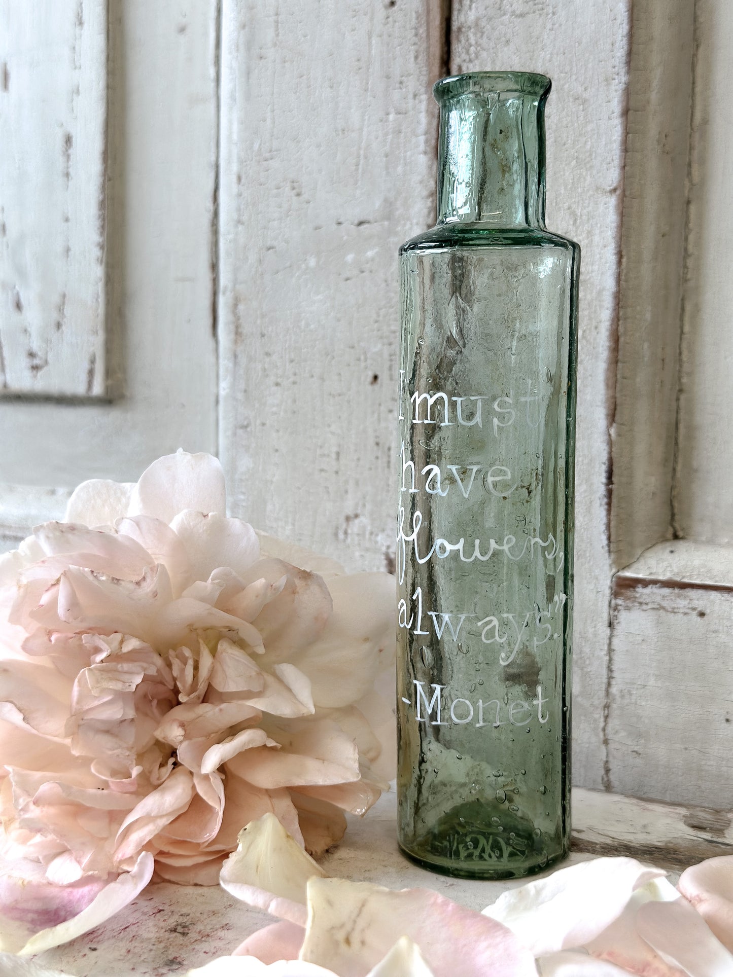 A beautiful Victorian bottle with a hand painted quote